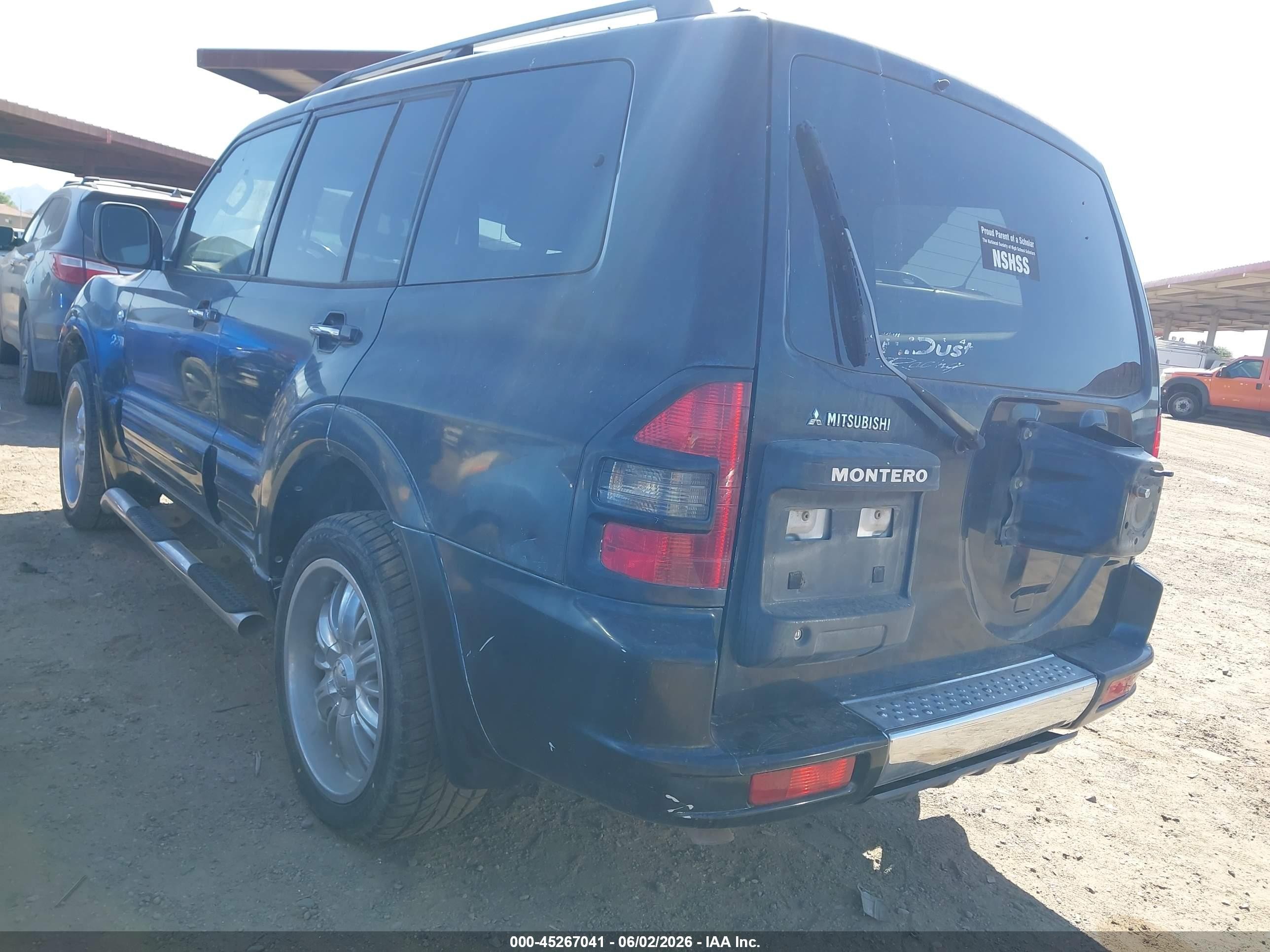 2002 Mitsubishi Montero Limited Black vin: JA4MW51R72J020909