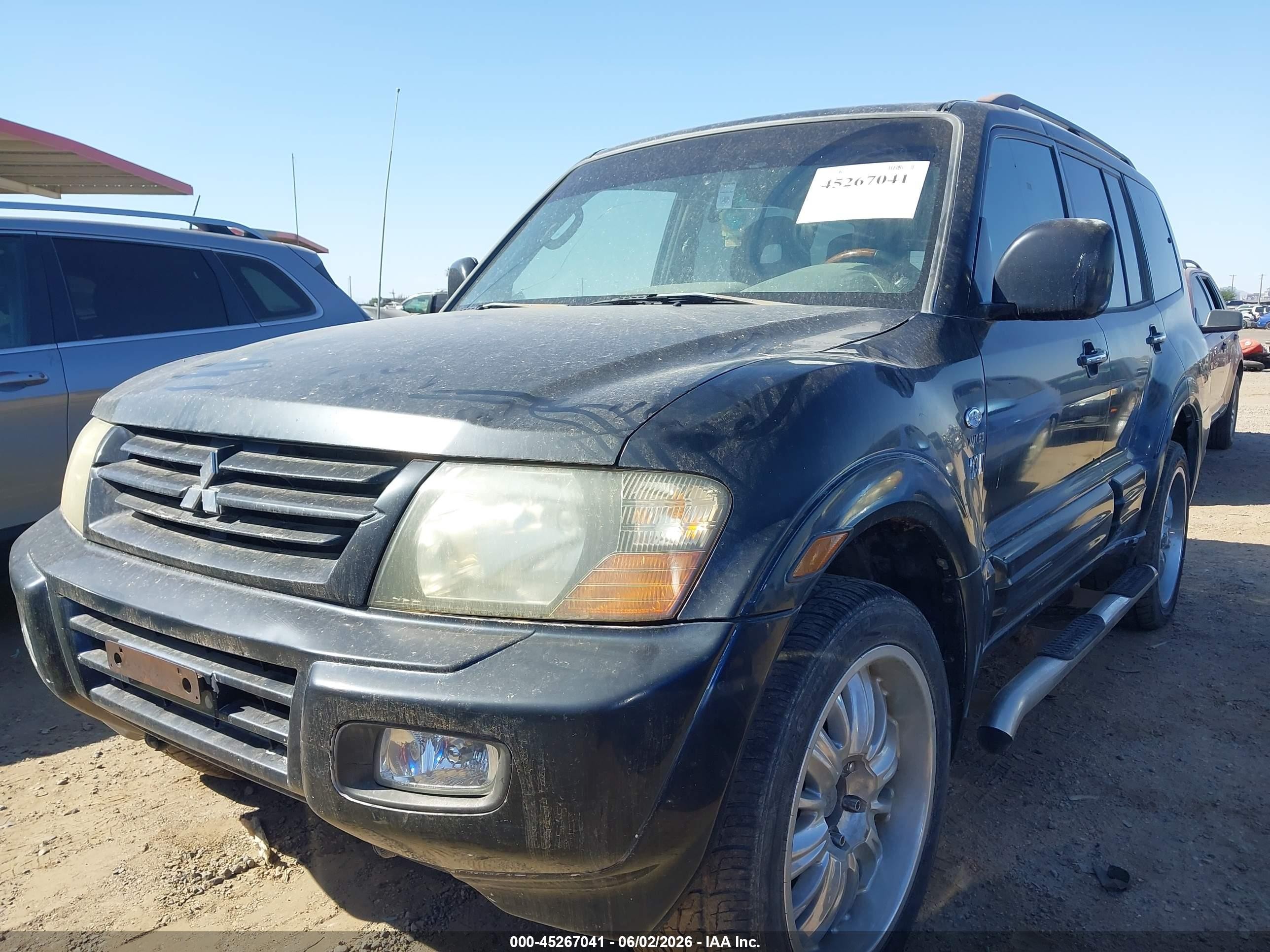 2002 Mitsubishi Montero Limited Black vin: JA4MW51R72J020909