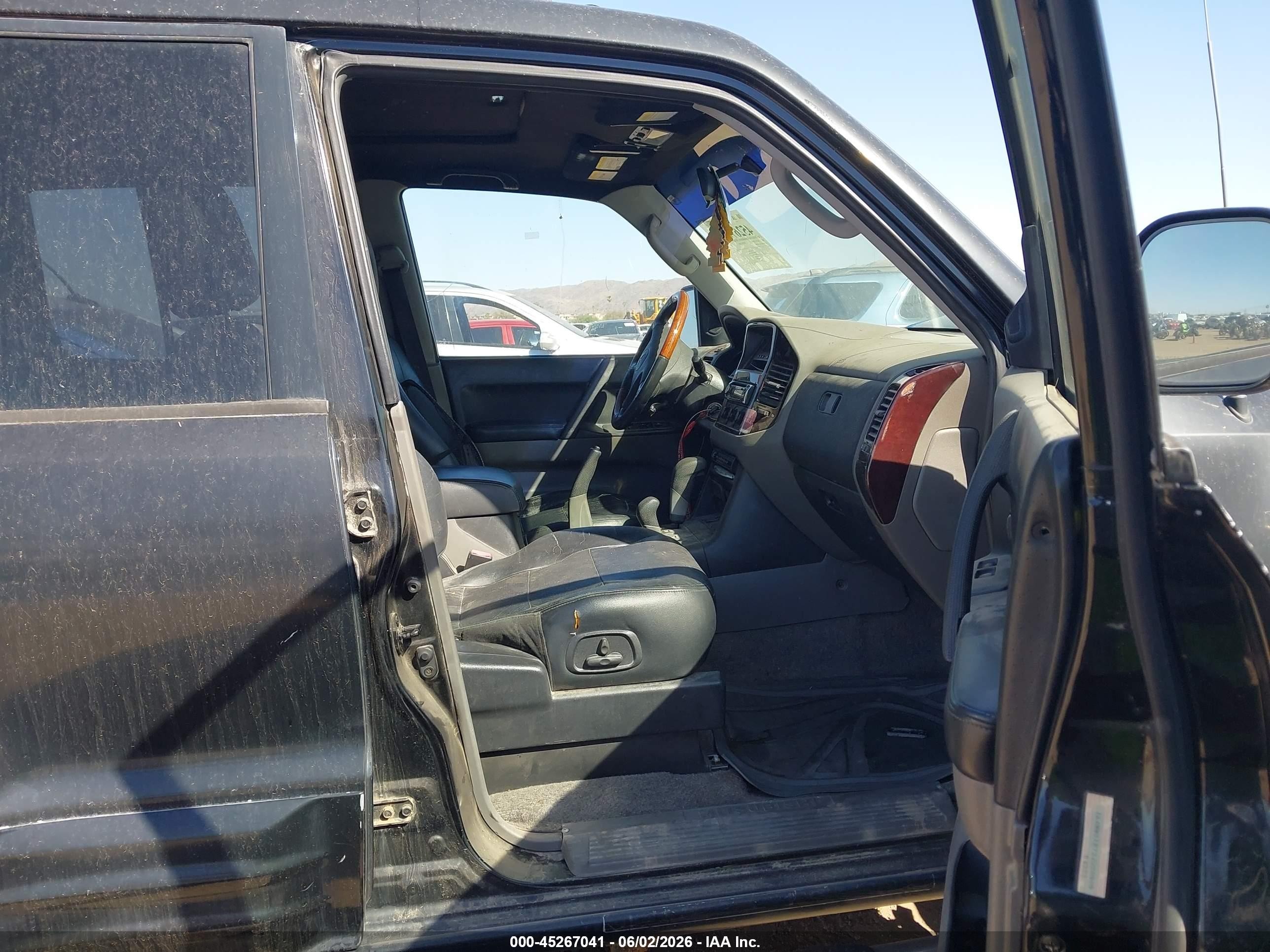 2002 Mitsubishi Montero Limited Black vin: JA4MW51R72J020909