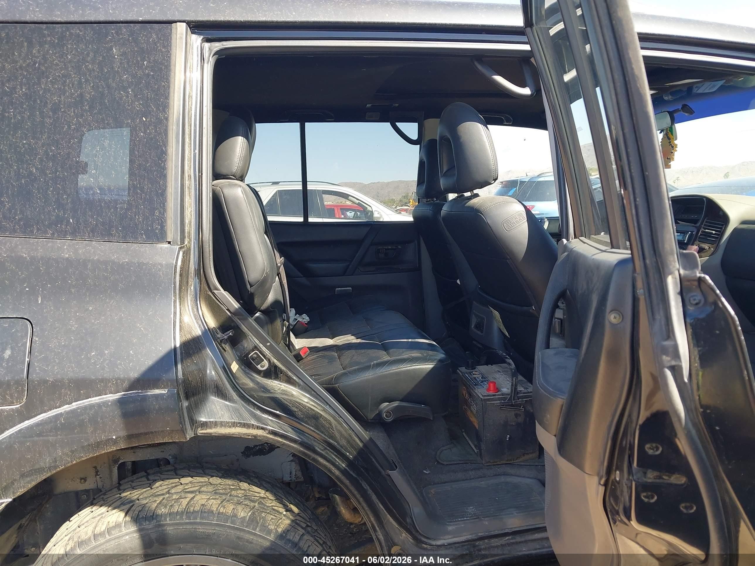 2002 Mitsubishi Montero Limited Black vin: JA4MW51R72J020909