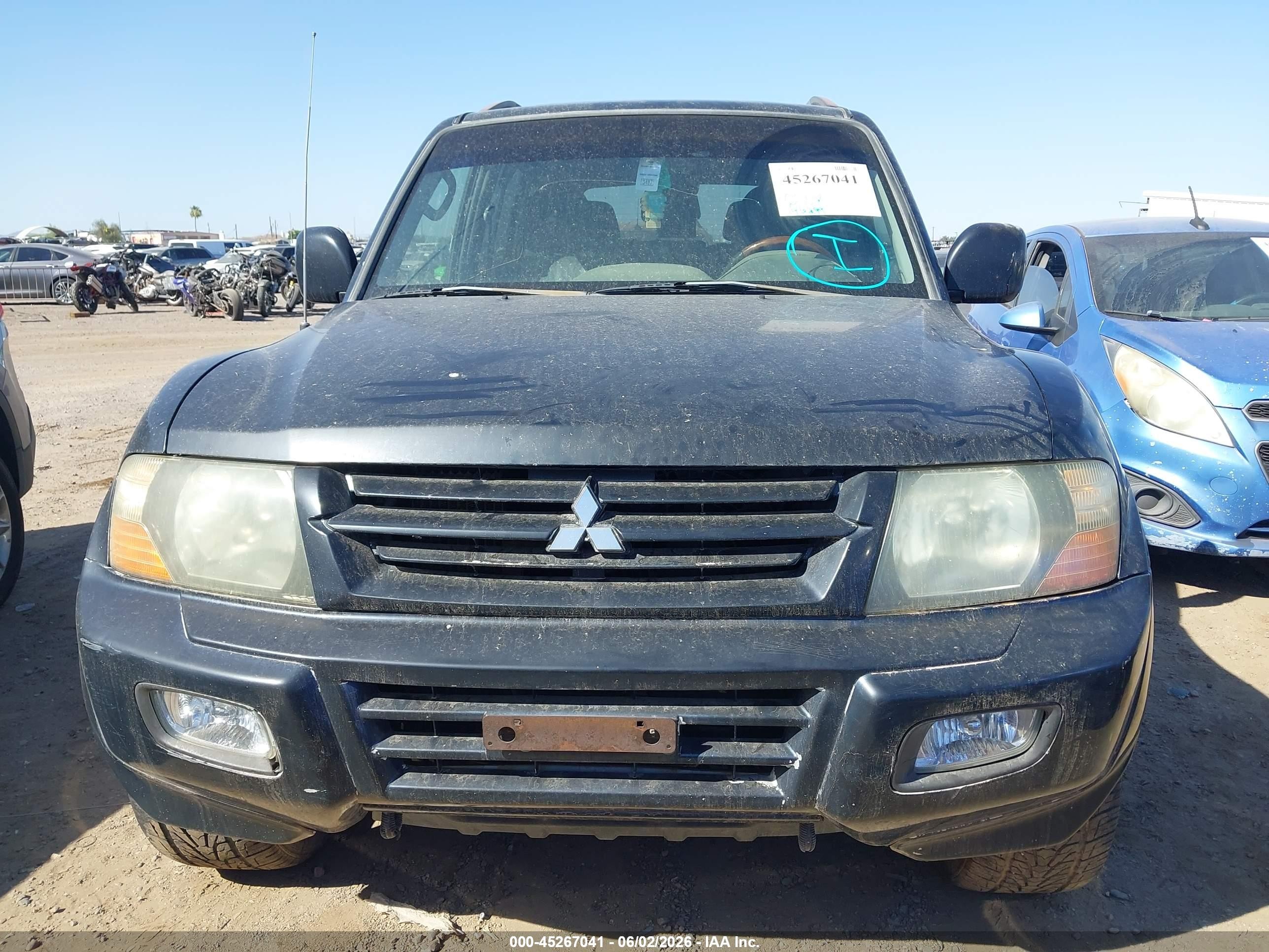 2002 Mitsubishi Montero Limited Black vin: JA4MW51R72J020909