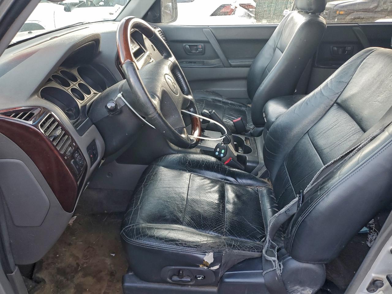 2002 Mitsubishi Montero Limited Silver vin: JA4MW51R72J058012