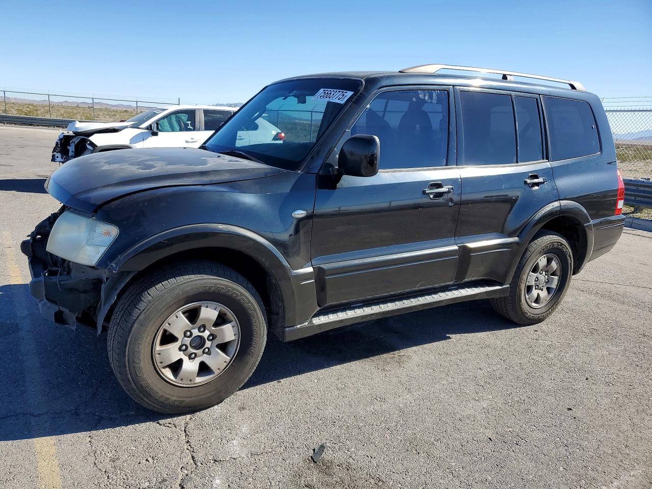 2004 Mitsubishi Montero Limited Черный vin: JA4MW51S44J009601