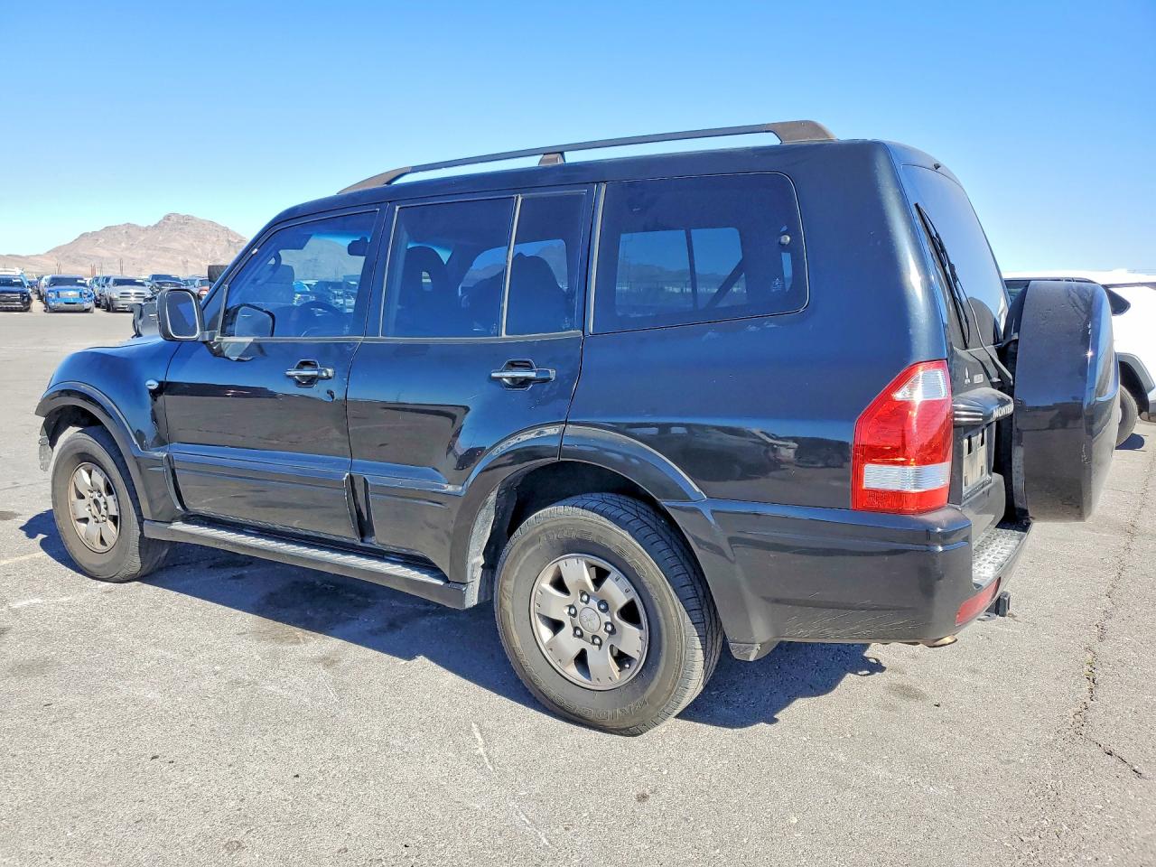 2004 Mitsubishi Montero Limited Черный vin: JA4MW51S44J009601