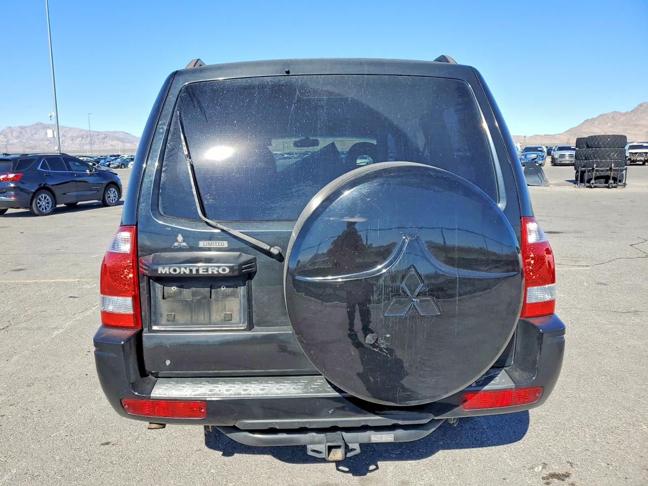 2004 Mitsubishi Montero Limited Черный vin: JA4MW51S44J009601