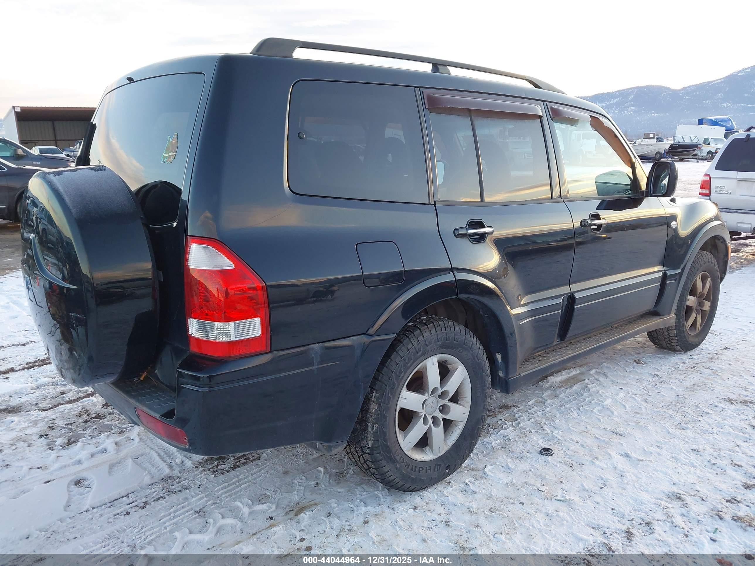 2005 Mitsubishi Montero Limited Черный vin: JA4MW51S95J004699