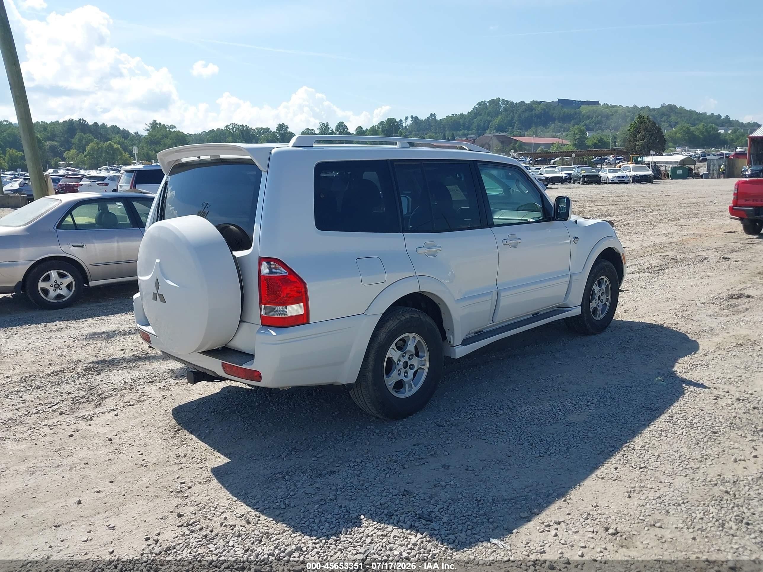 2003 Mitsubishi Montero 20th Anniversary White vin: JA4NW61SX3J038948