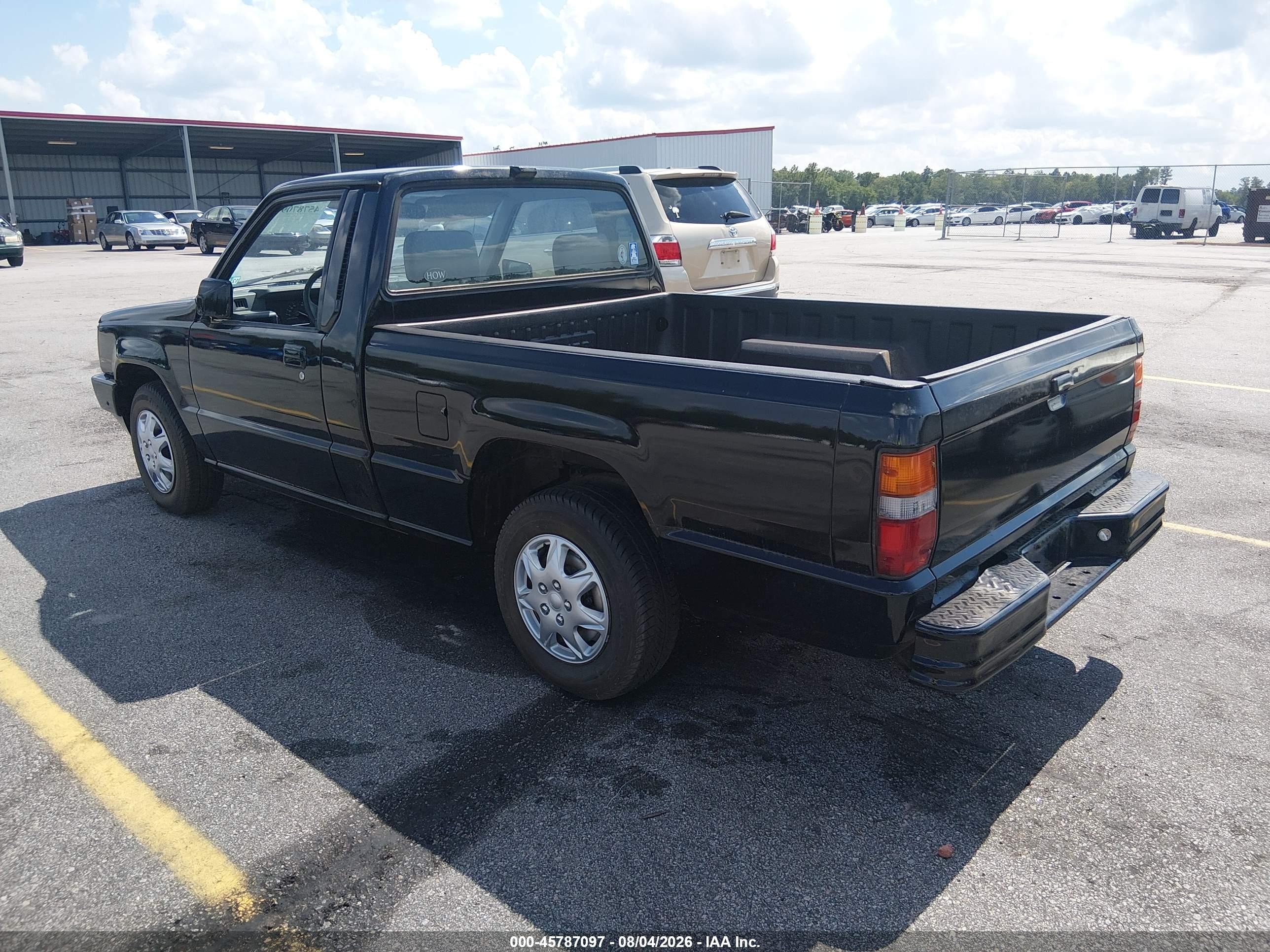 1990 Mitsubishi Mighty Max / S   Black vin: JA7FL24W1LP011061