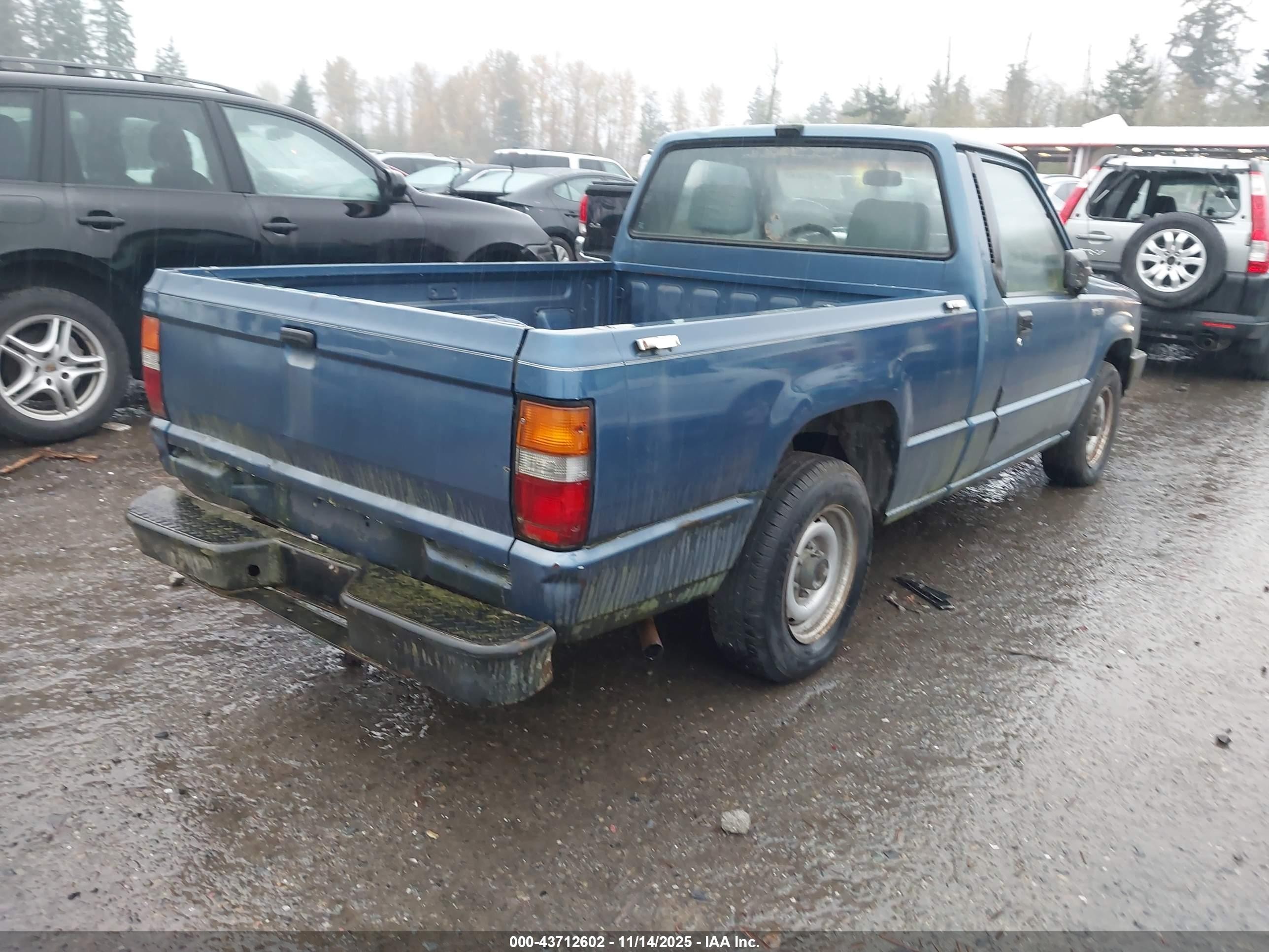 1990 Mitsubishi Mighty Max / S   Blue vin: JA7FL24W1LP016860