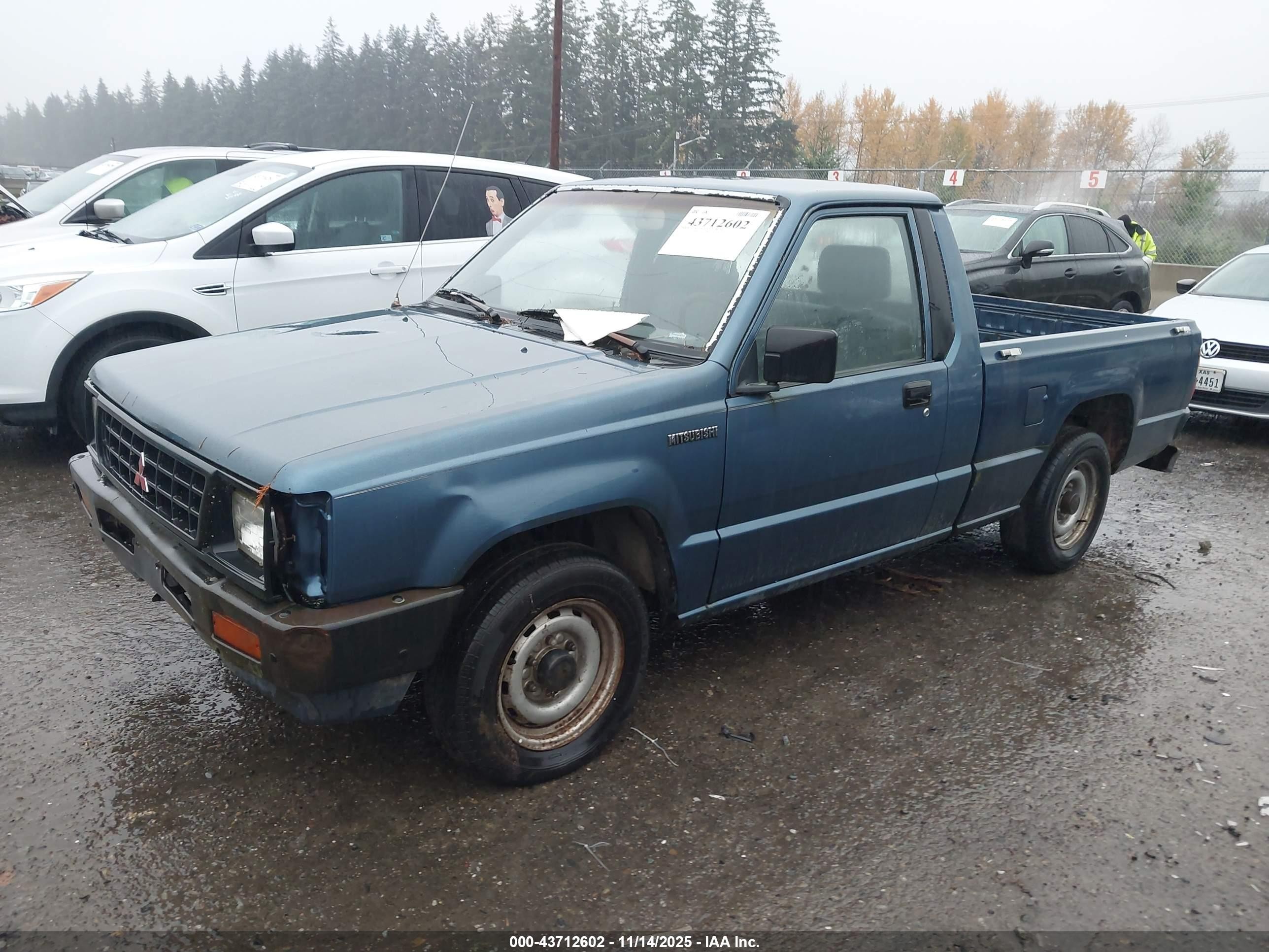 1990 Mitsubishi Mighty Max / S   Blue vin: JA7FL24W1LP016860
