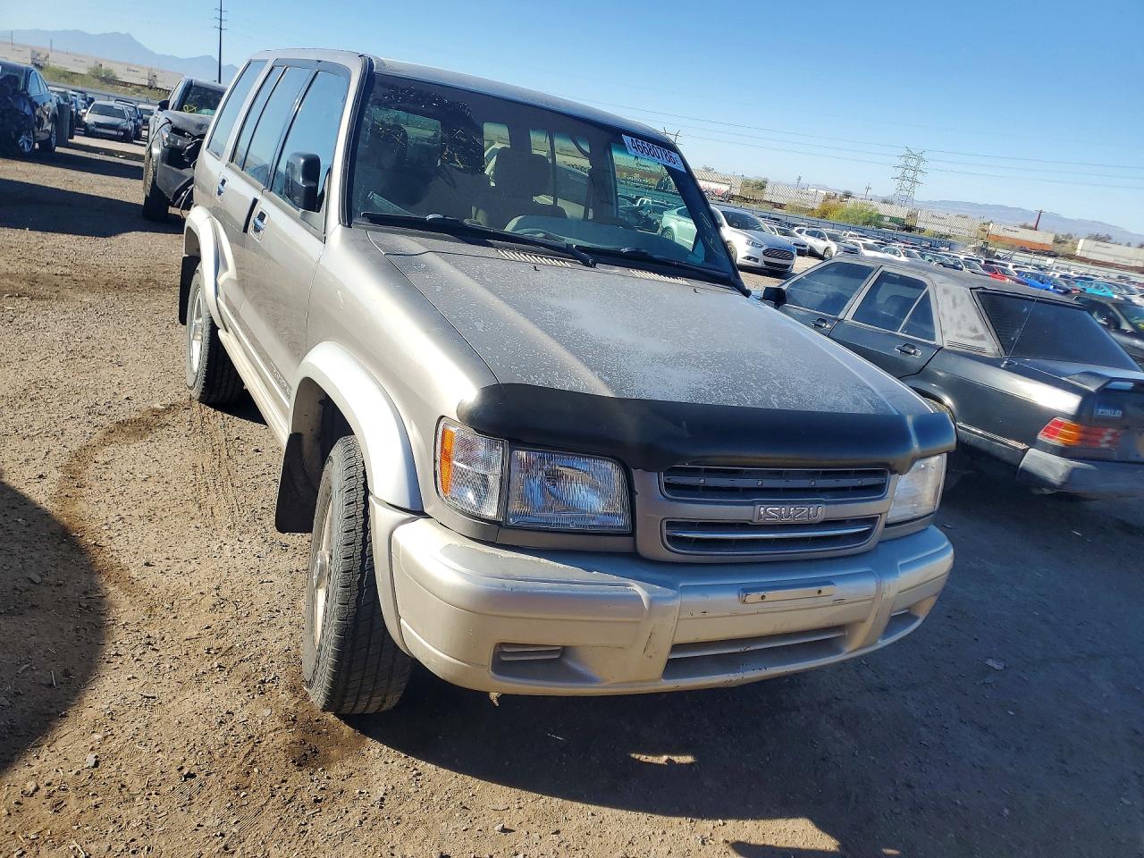 2002 Isuzu Trooper S Gold vin: JACDS58X927J00925