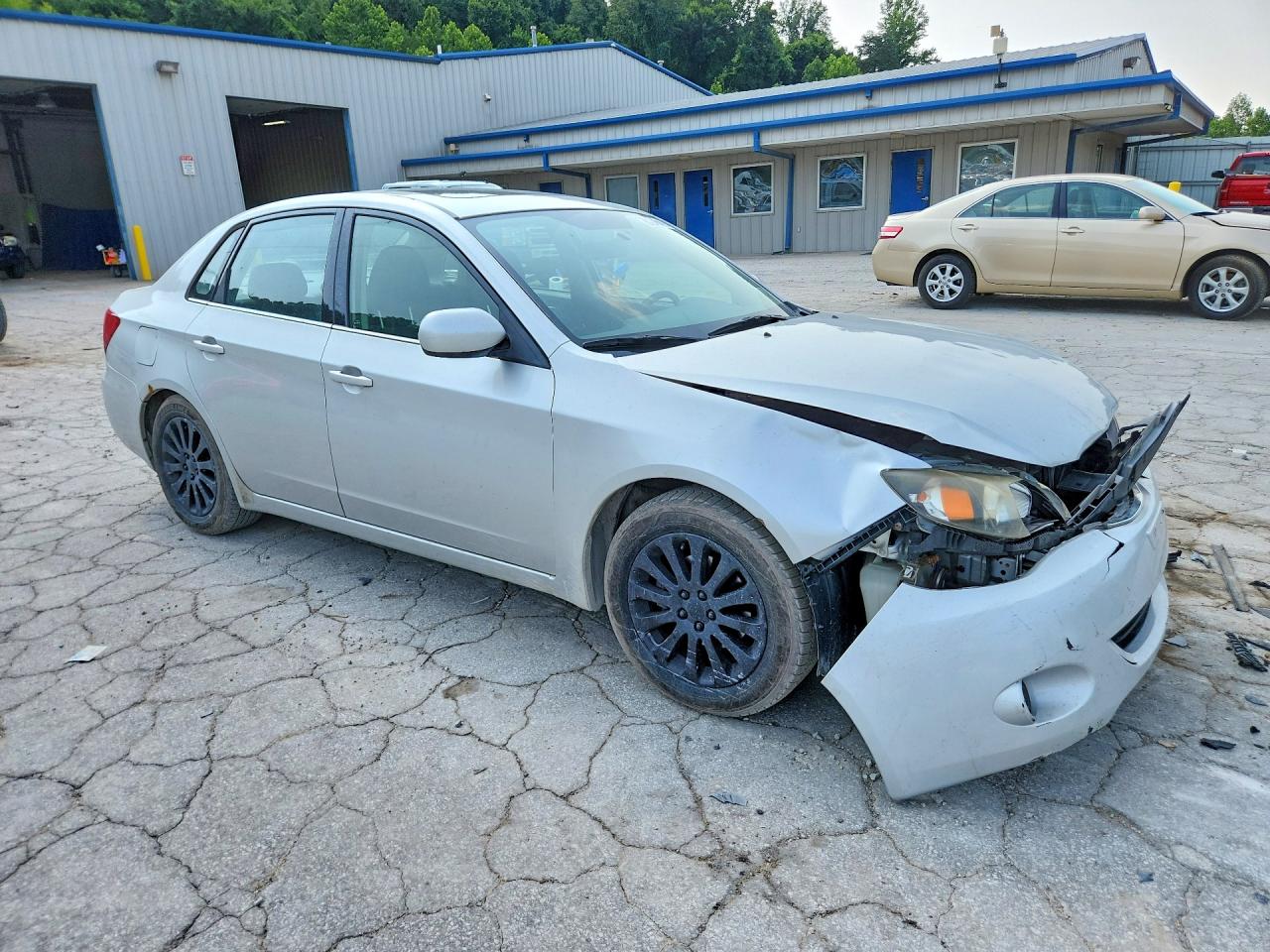 2009 Subaru Impreza 2.5i Premium Серебряный vin: JF1GE60639H507681