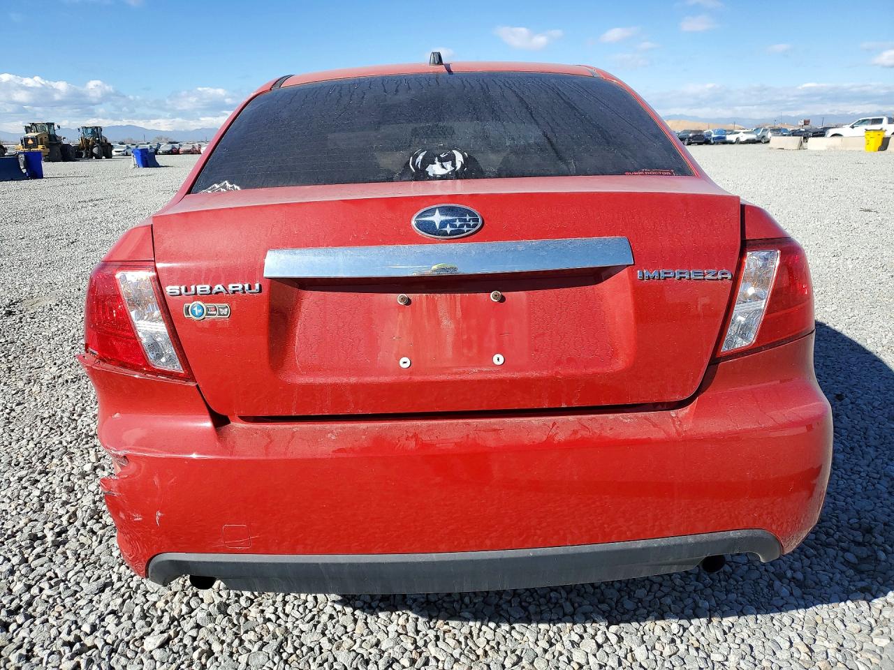 2009 Subaru Impreza 2.5i Premium Red vin: JF1GE60699H512416