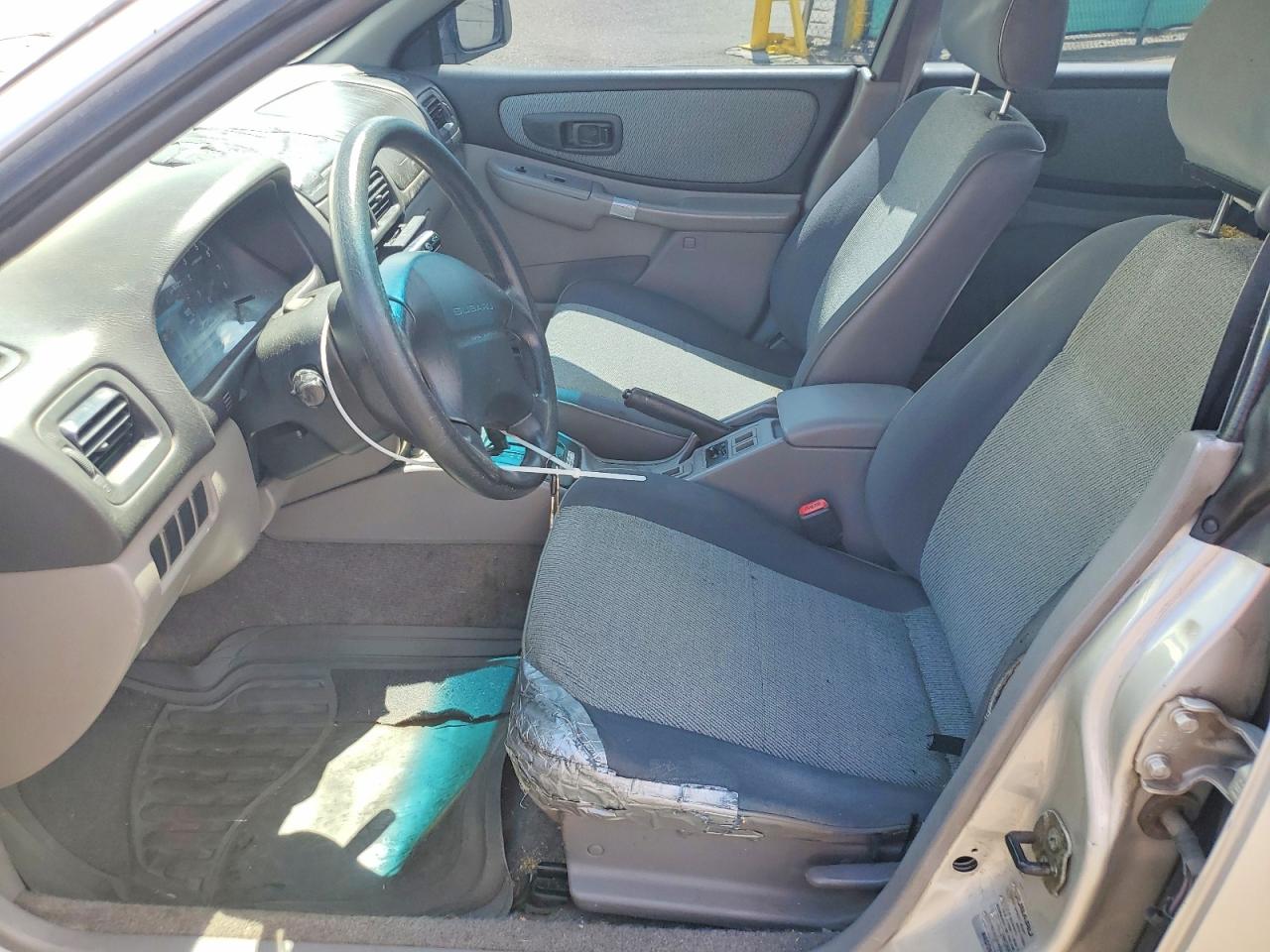 1999 Subaru Impreza L Silver vin: JF1GF4350XH804568
