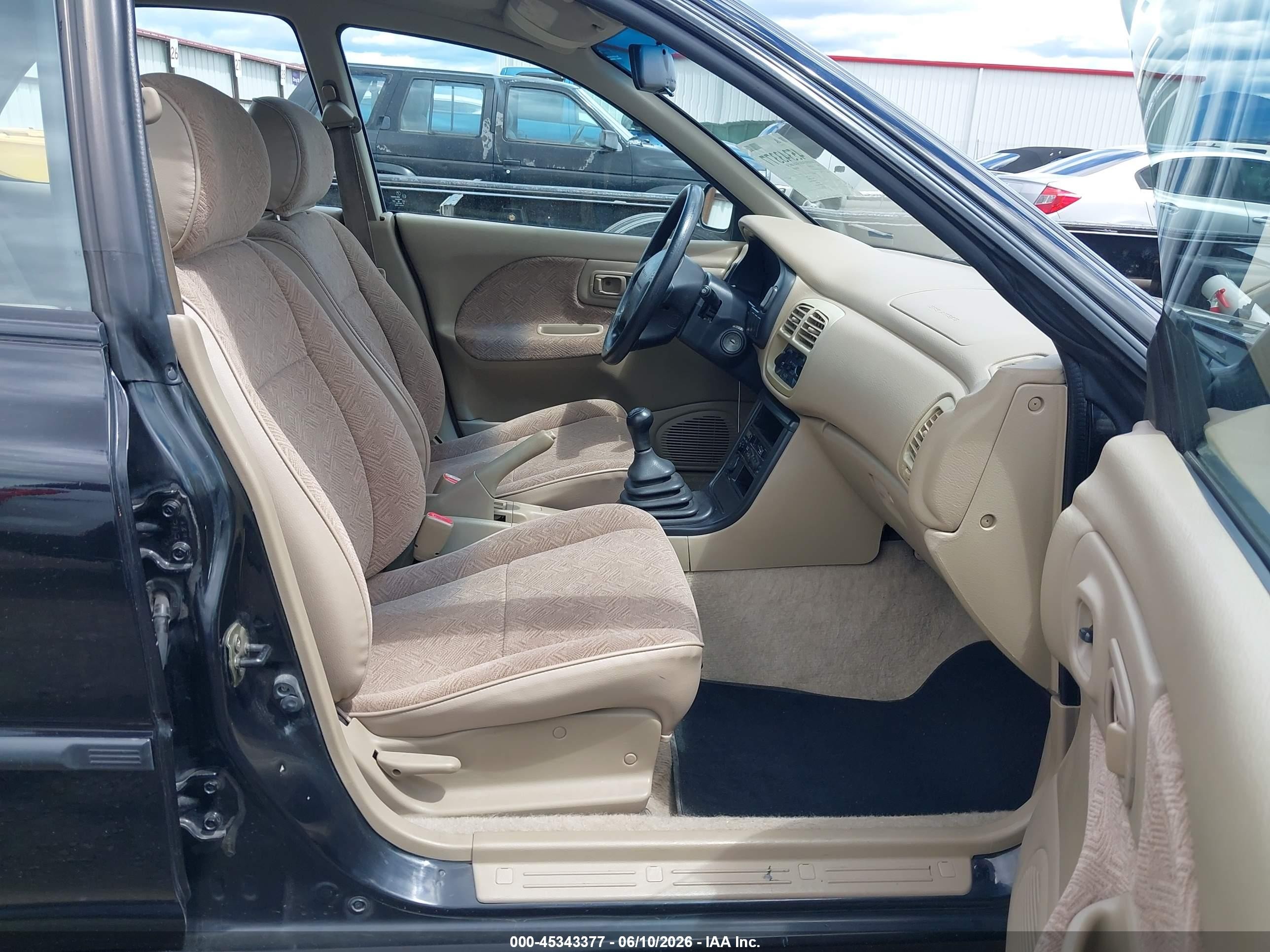 1997 Subaru Impreza L Black vin: JF1GF4352VG816448