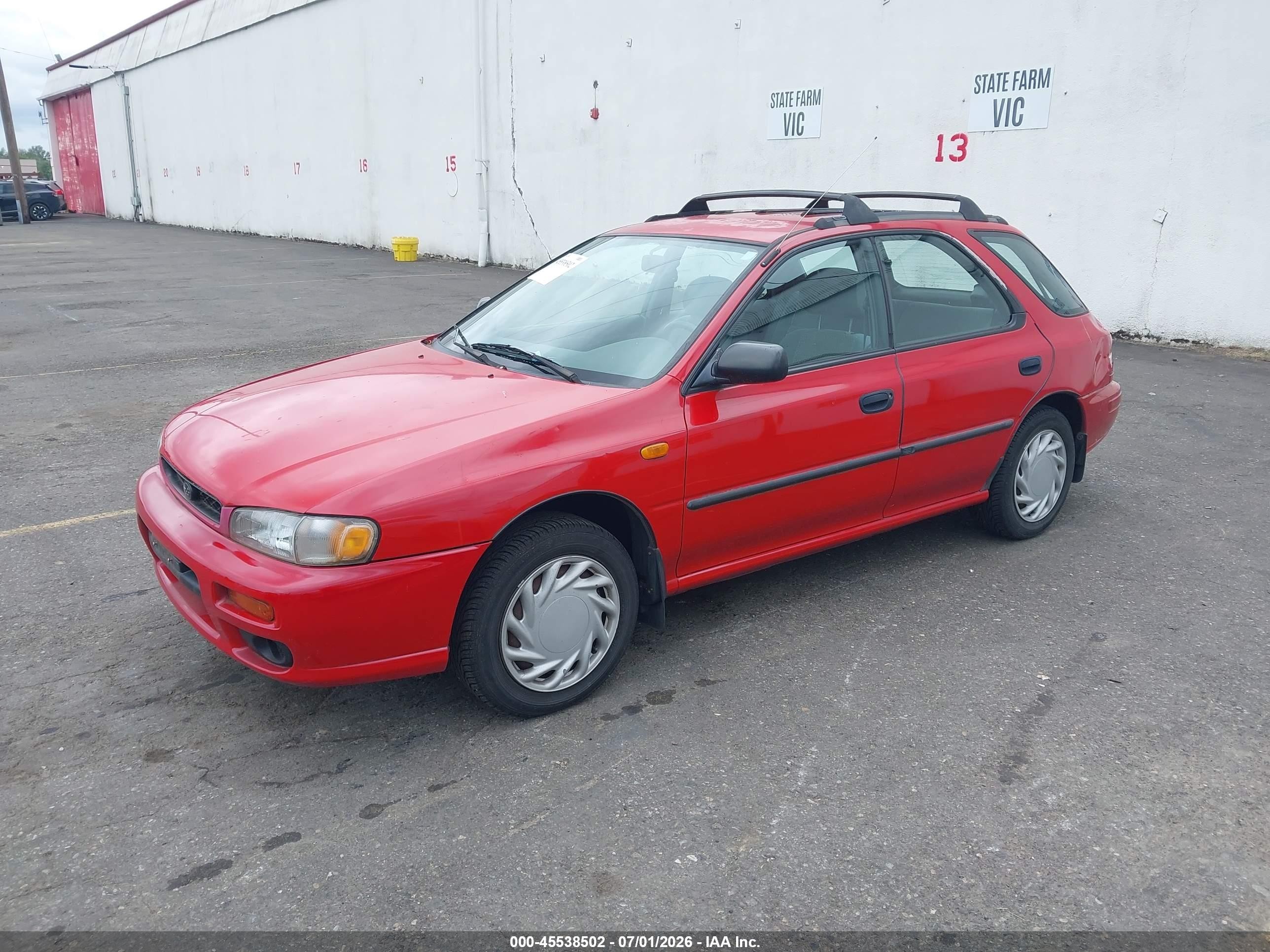 1997 Subaru Impreza L Red vin: JF1GF4357VH819212