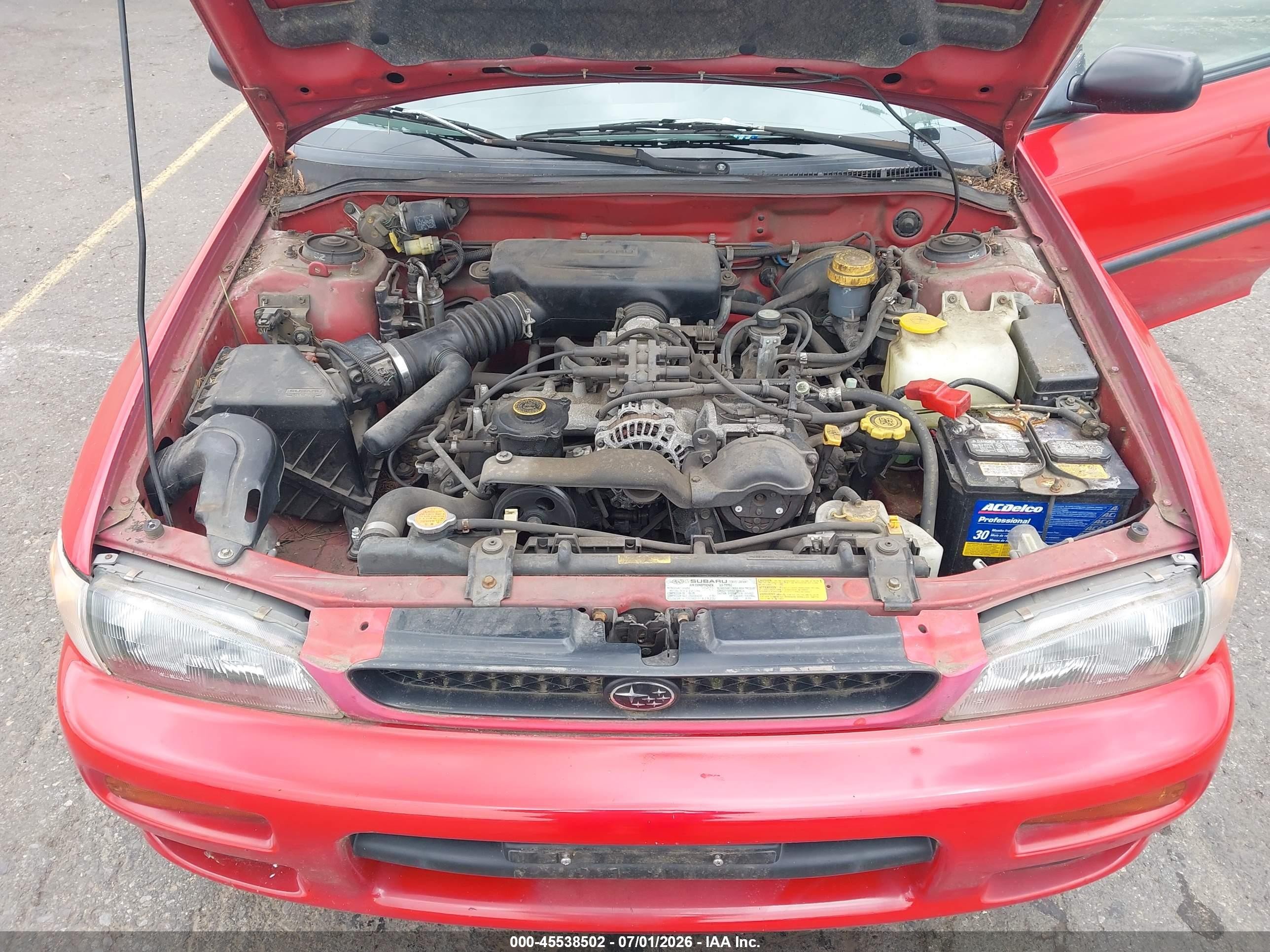 1997 Subaru Impreza L Red vin: JF1GF4357VH819212
