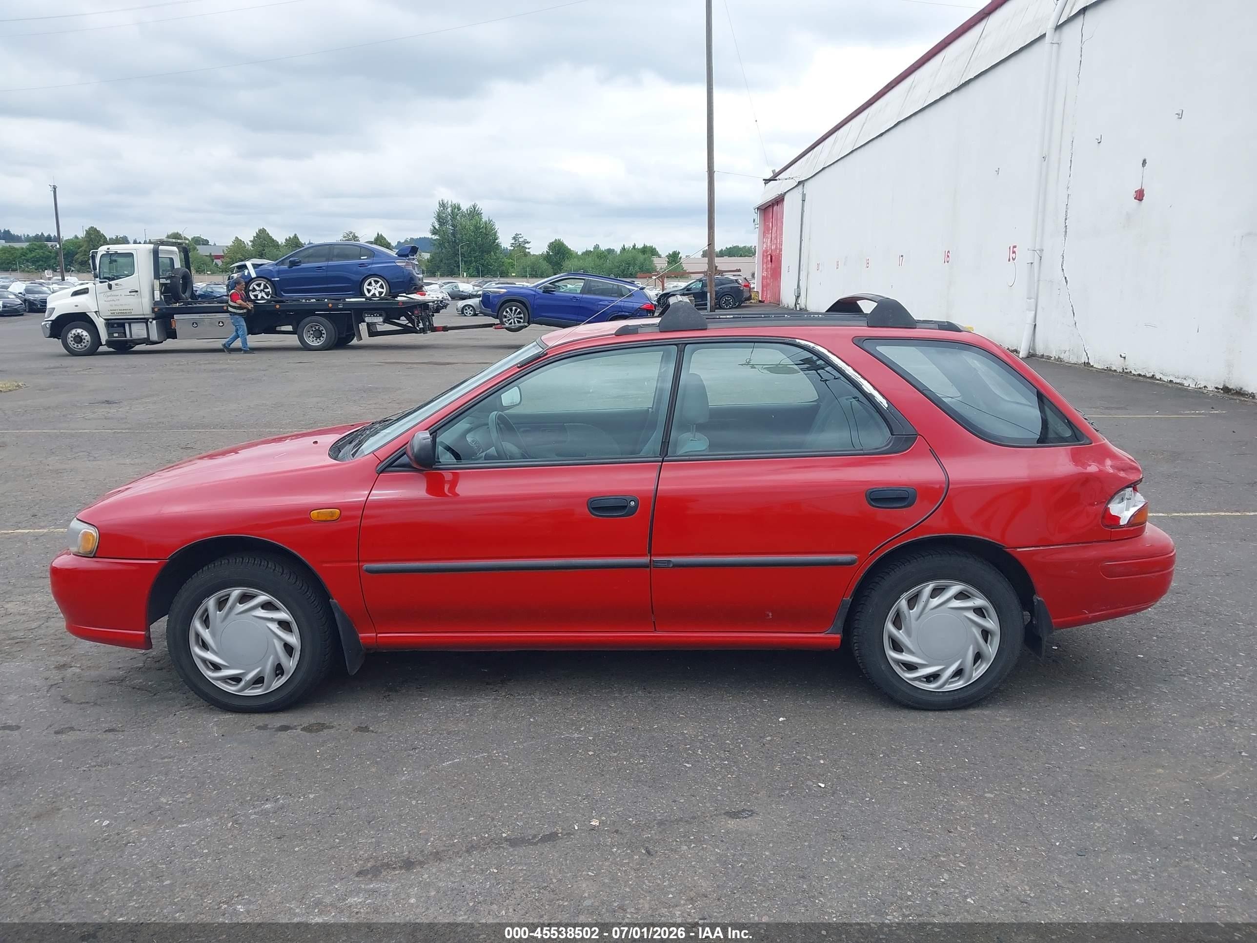 1997 Subaru Impreza L Red vin: JF1GF4357VH819212