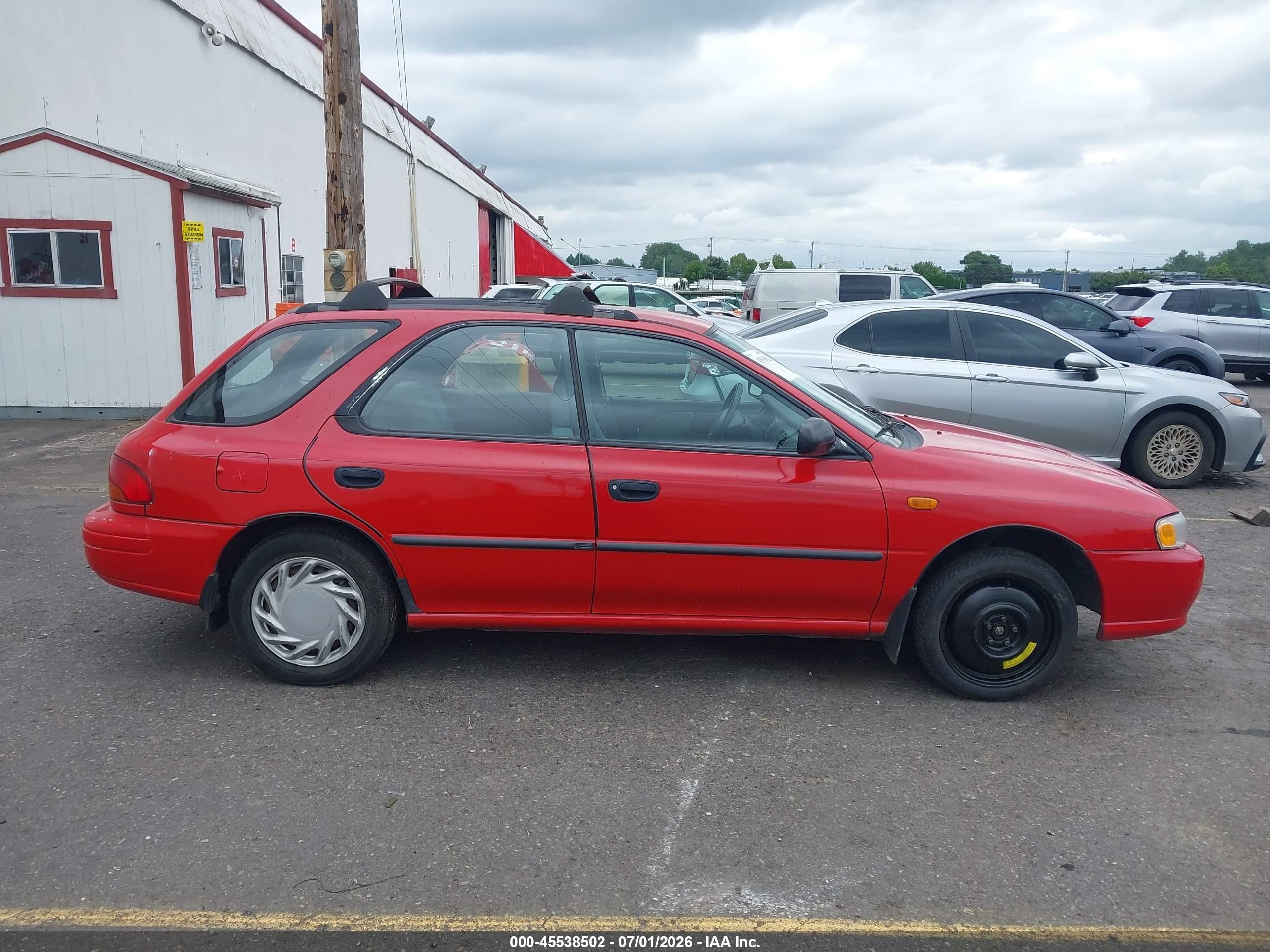 1997 Subaru Impreza L Red vin: JF1GF4357VH819212