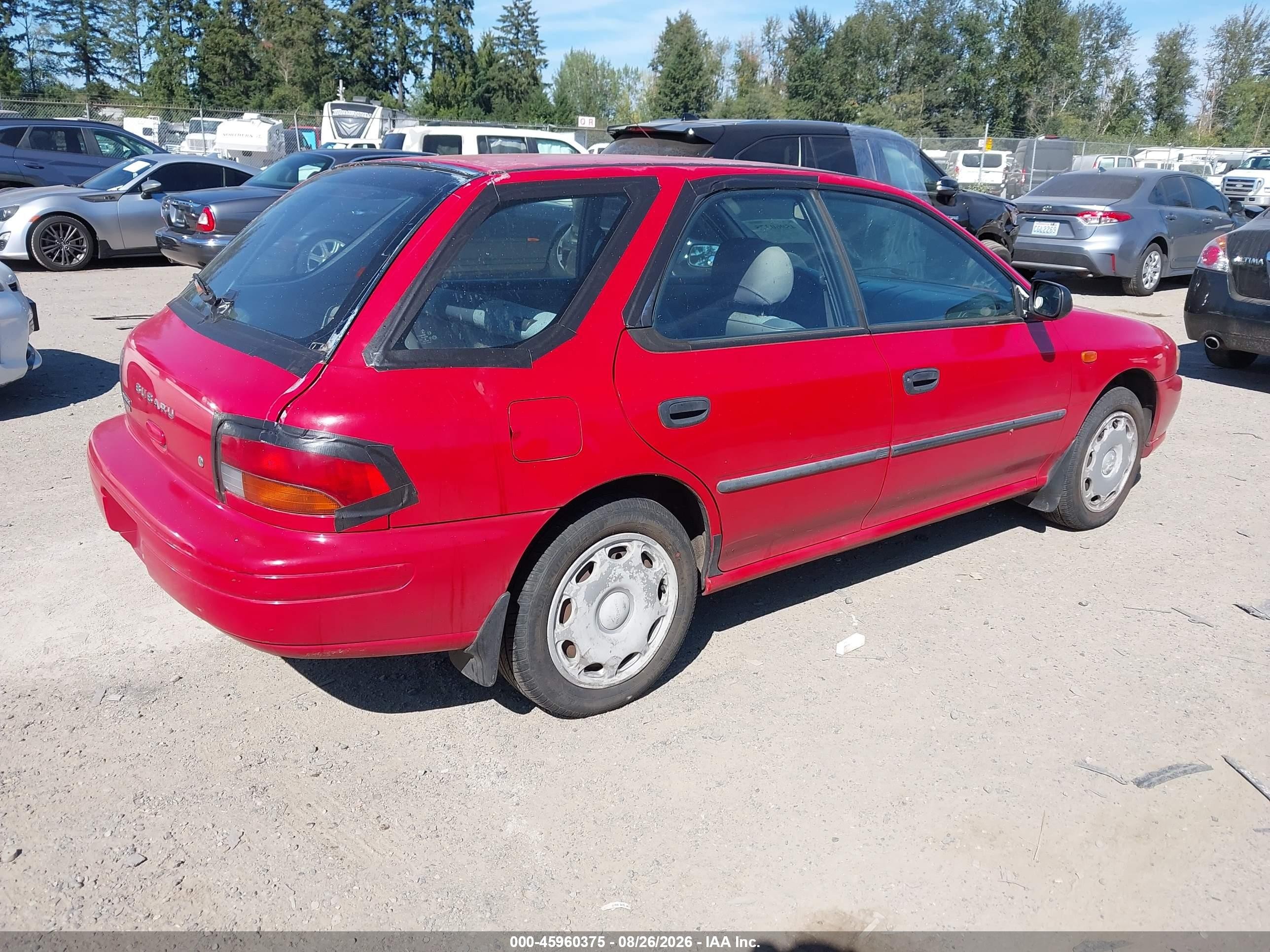 1999 Subaru Impreza L Red vin: JF1GF4358XH803605