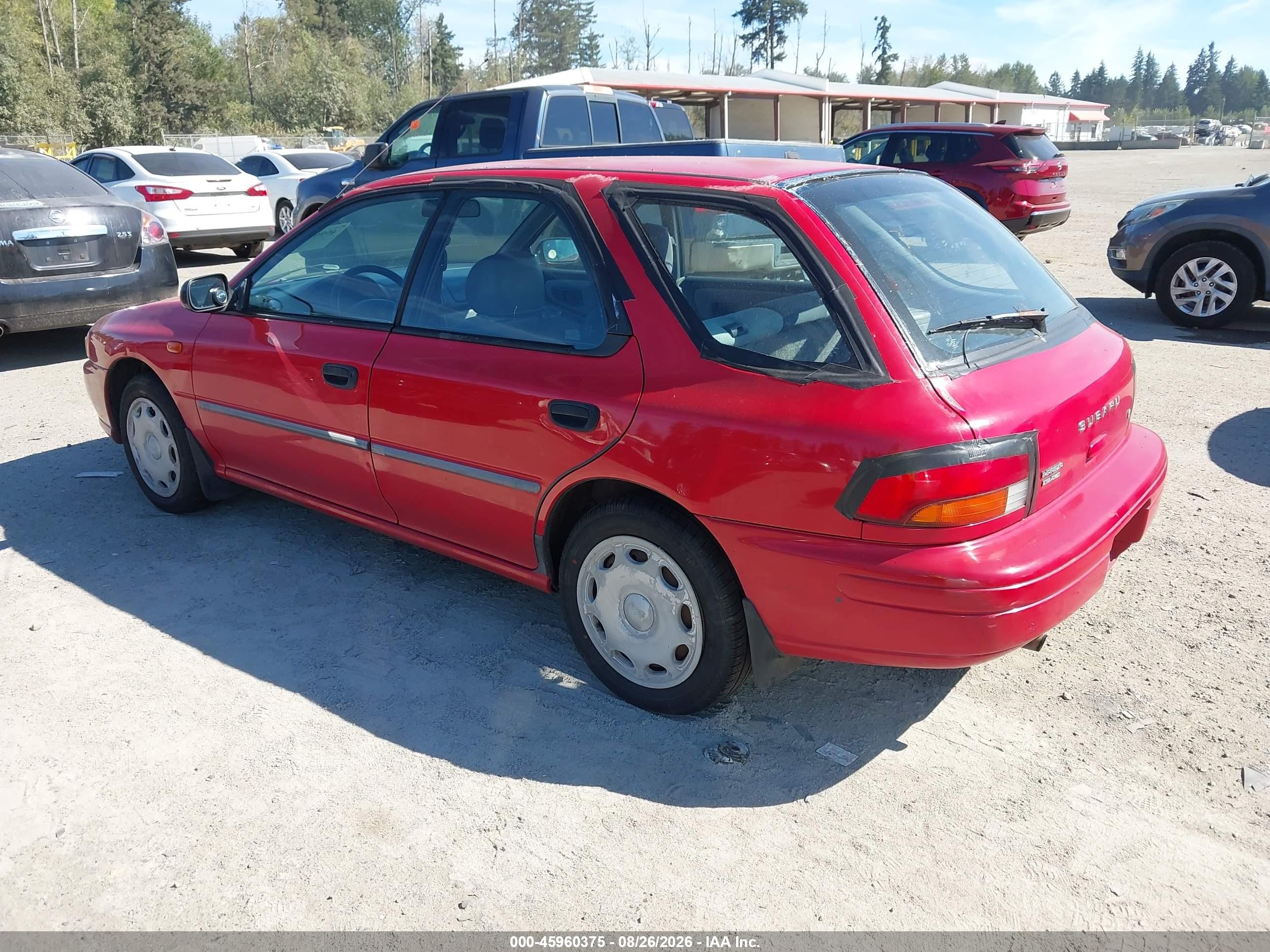 1999 Subaru Impreza L Red vin: JF1GF4358XH803605