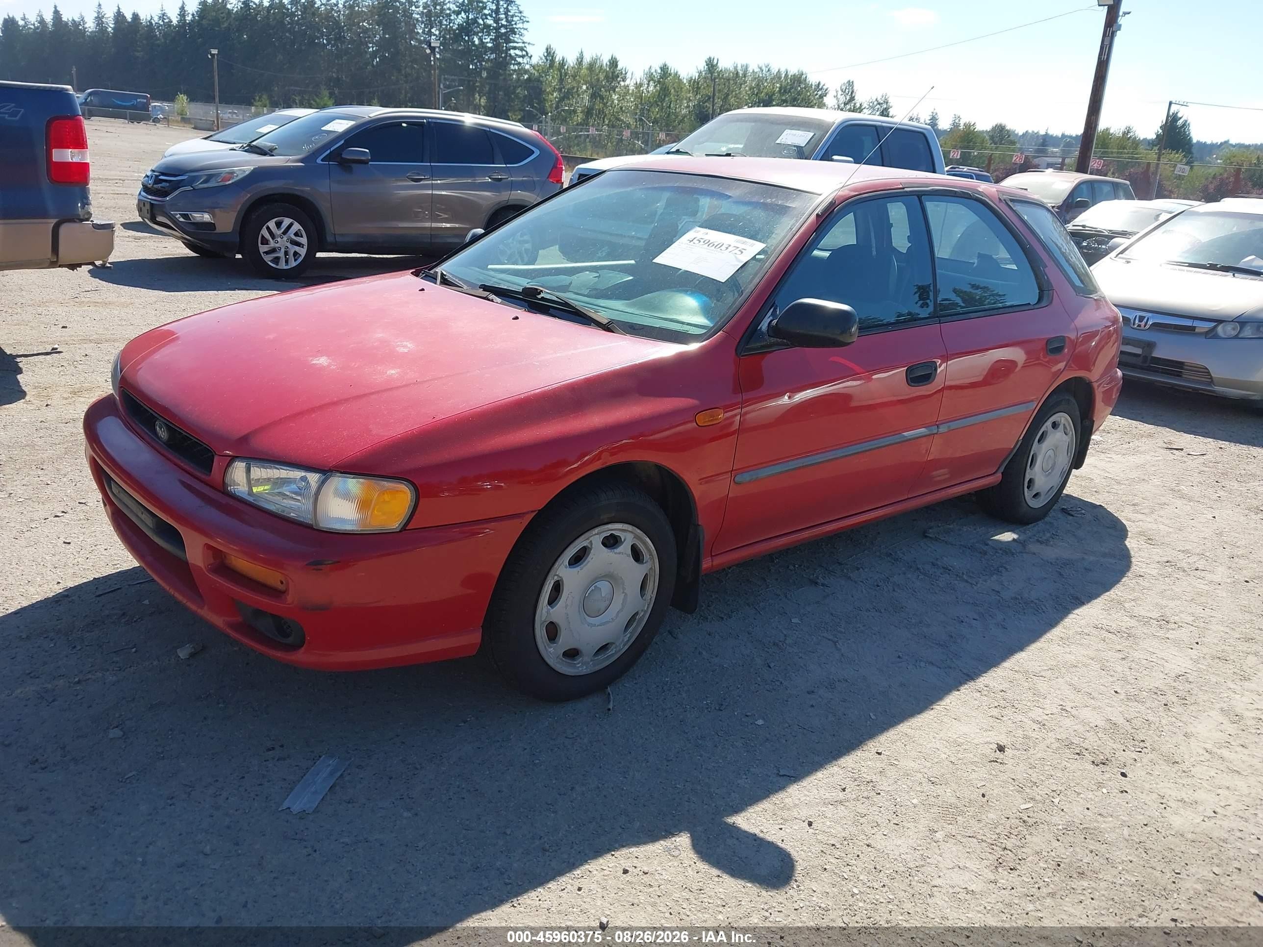 1999 Subaru Impreza L Red vin: JF1GF4358XH803605