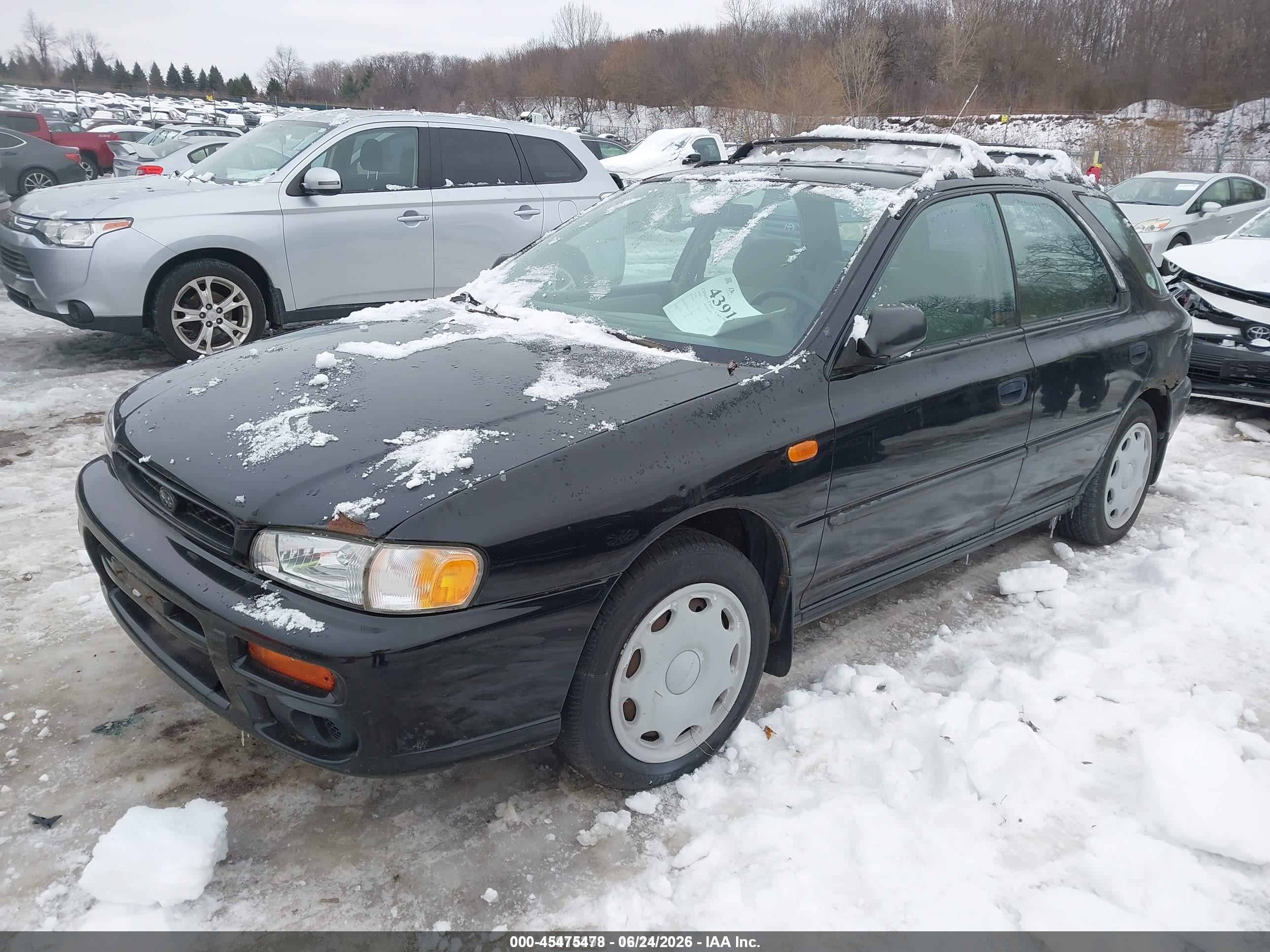 1999 Subaru Impreza L Black vin: JF1GF435XXH811155