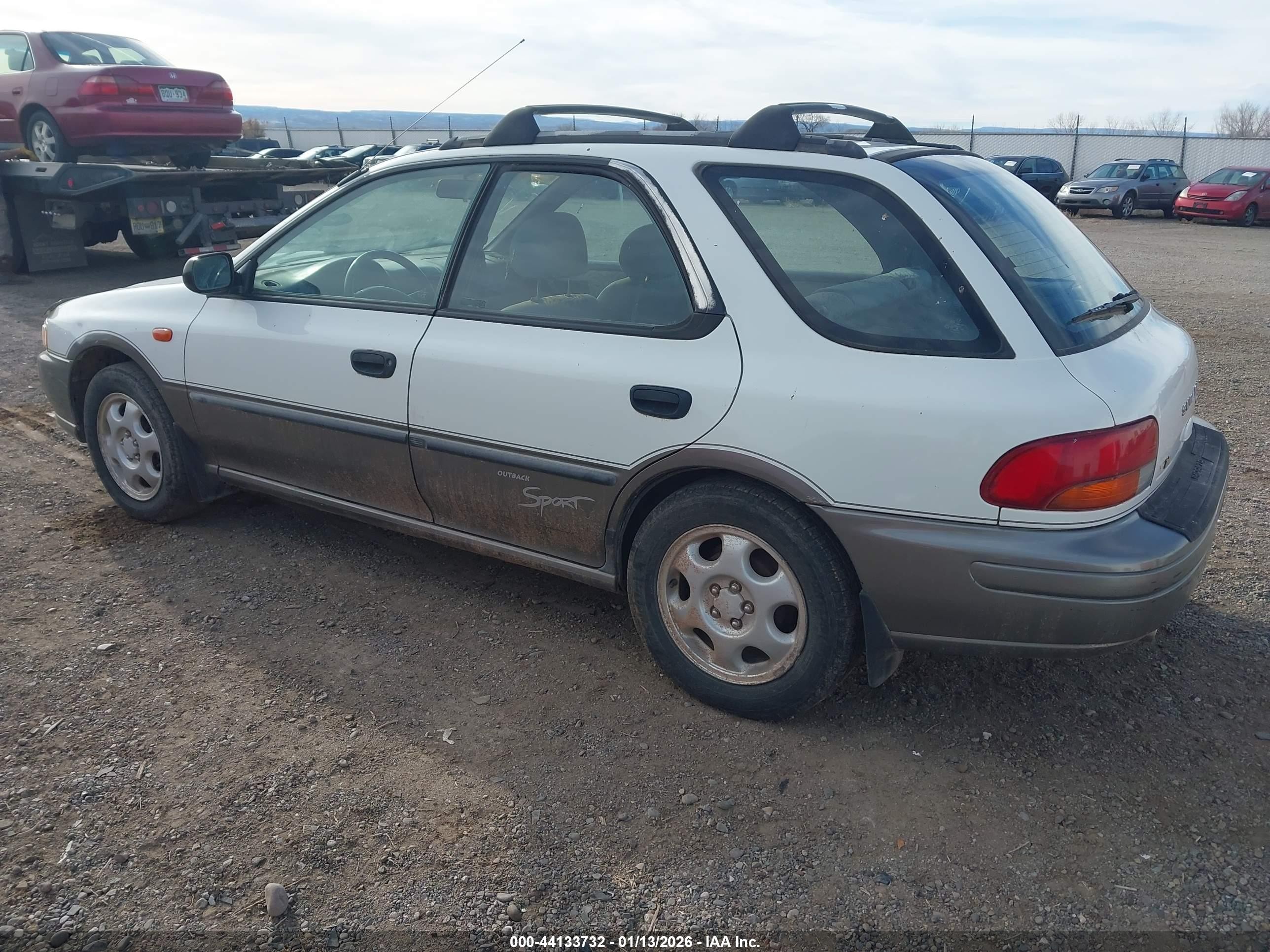 1998 Subaru Impreza Outback Sport White vin: JF1GF4850WH806943