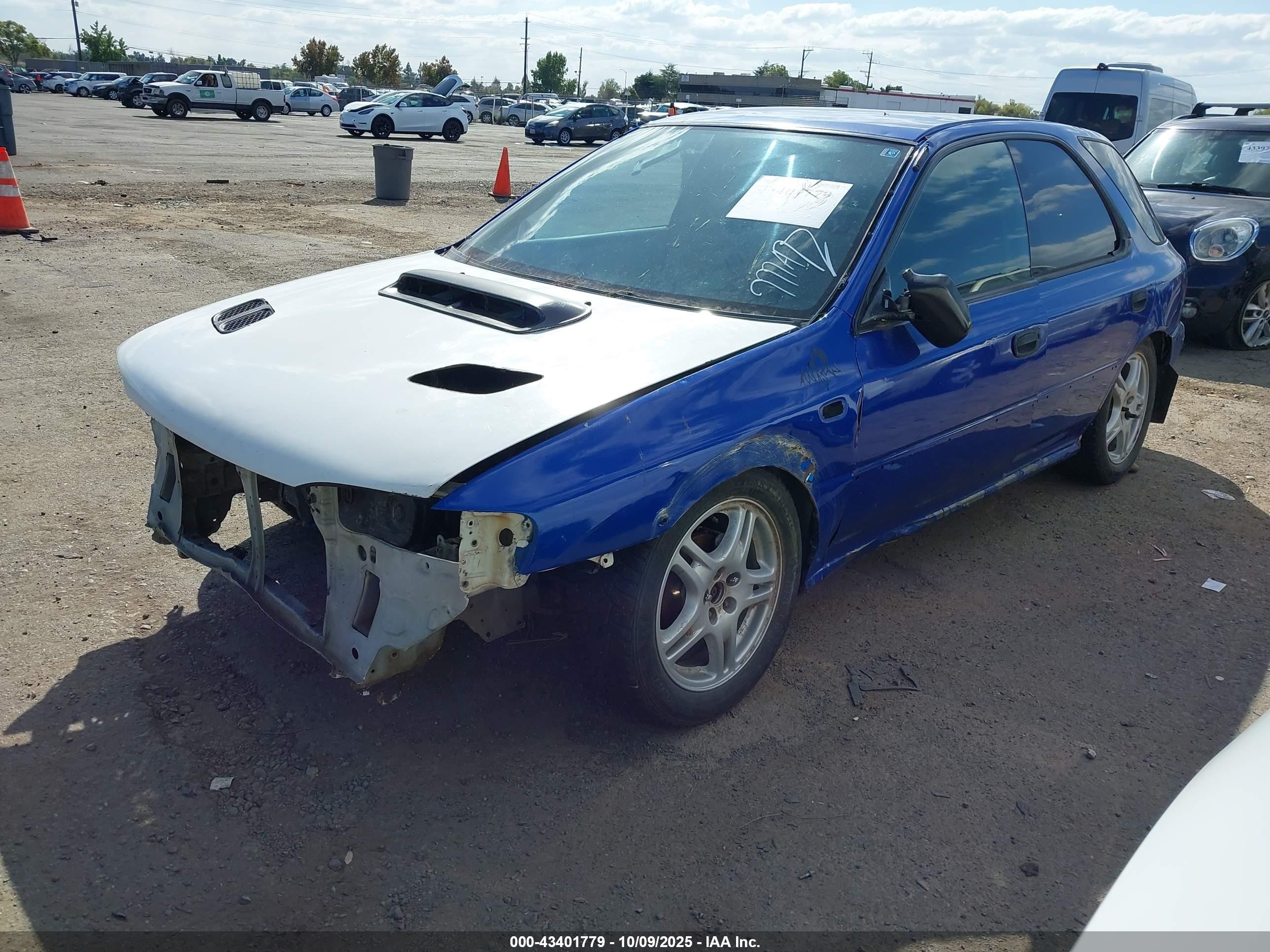 1998 Subaru Impreza Outback Sport Blue vin: JF1GF4853WH812834