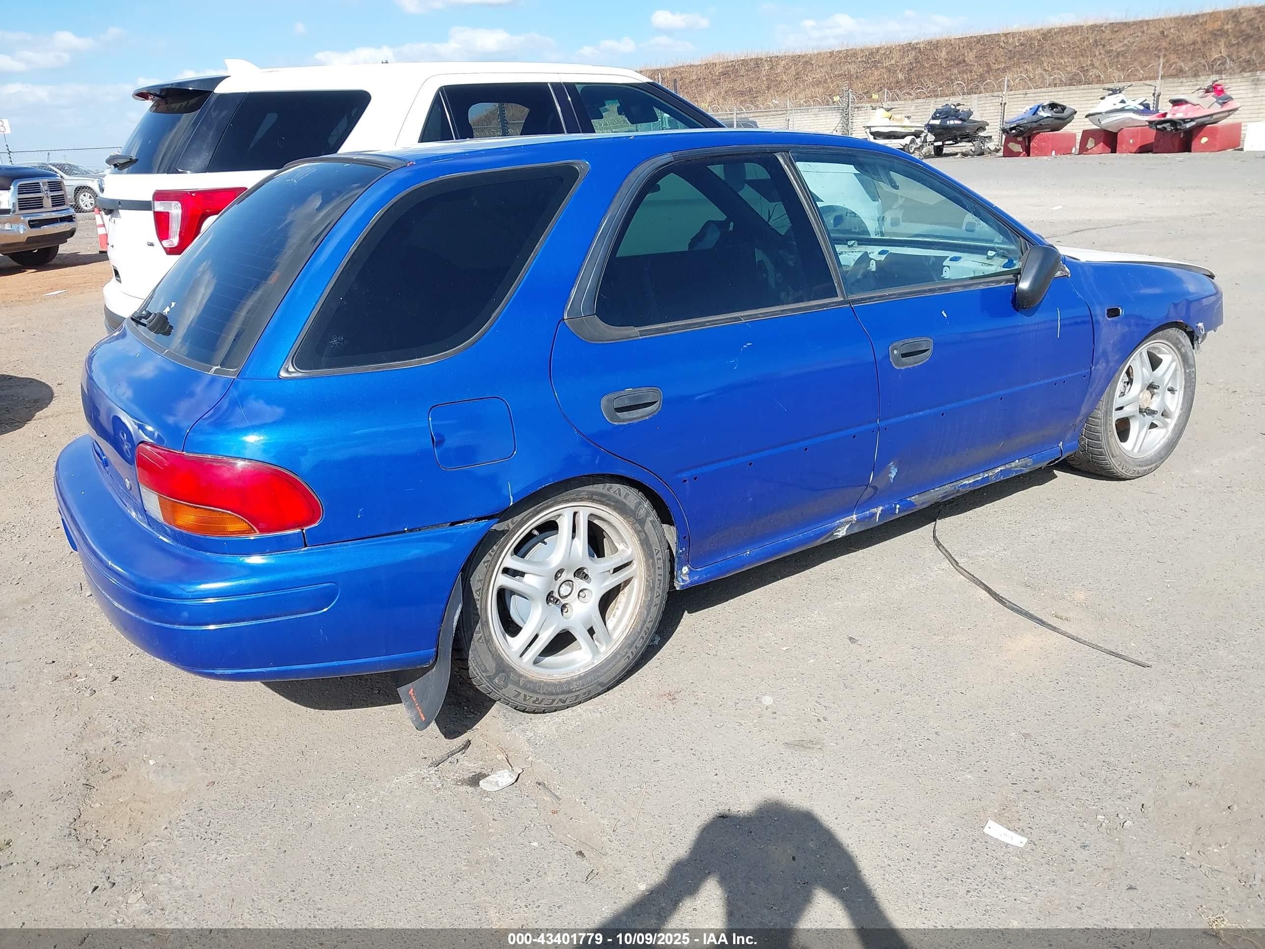 1998 Subaru Impreza Outback Sport Blue vin: JF1GF4853WH812834