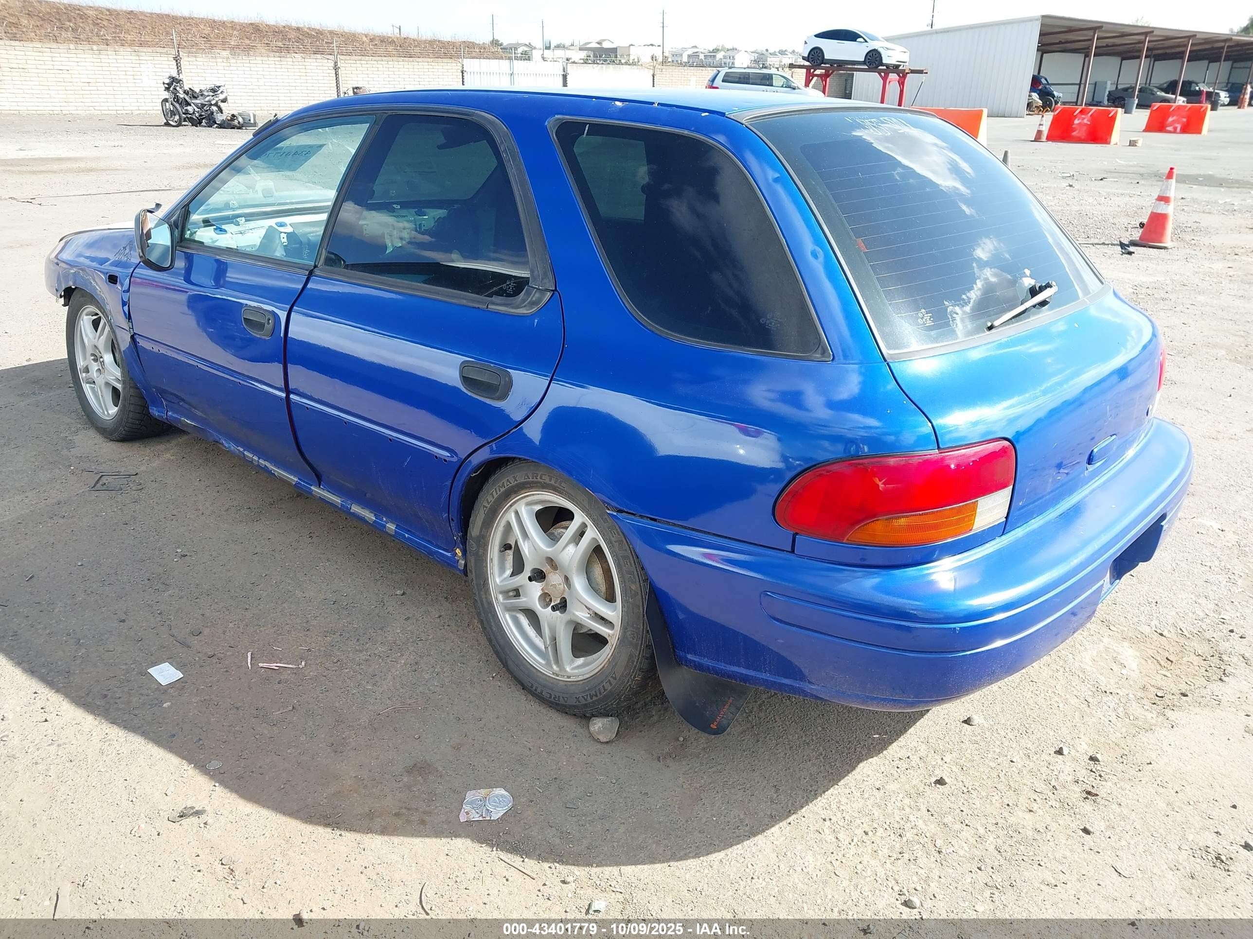 1998 Subaru Impreza Outback Sport Blue vin: JF1GF4853WH812834