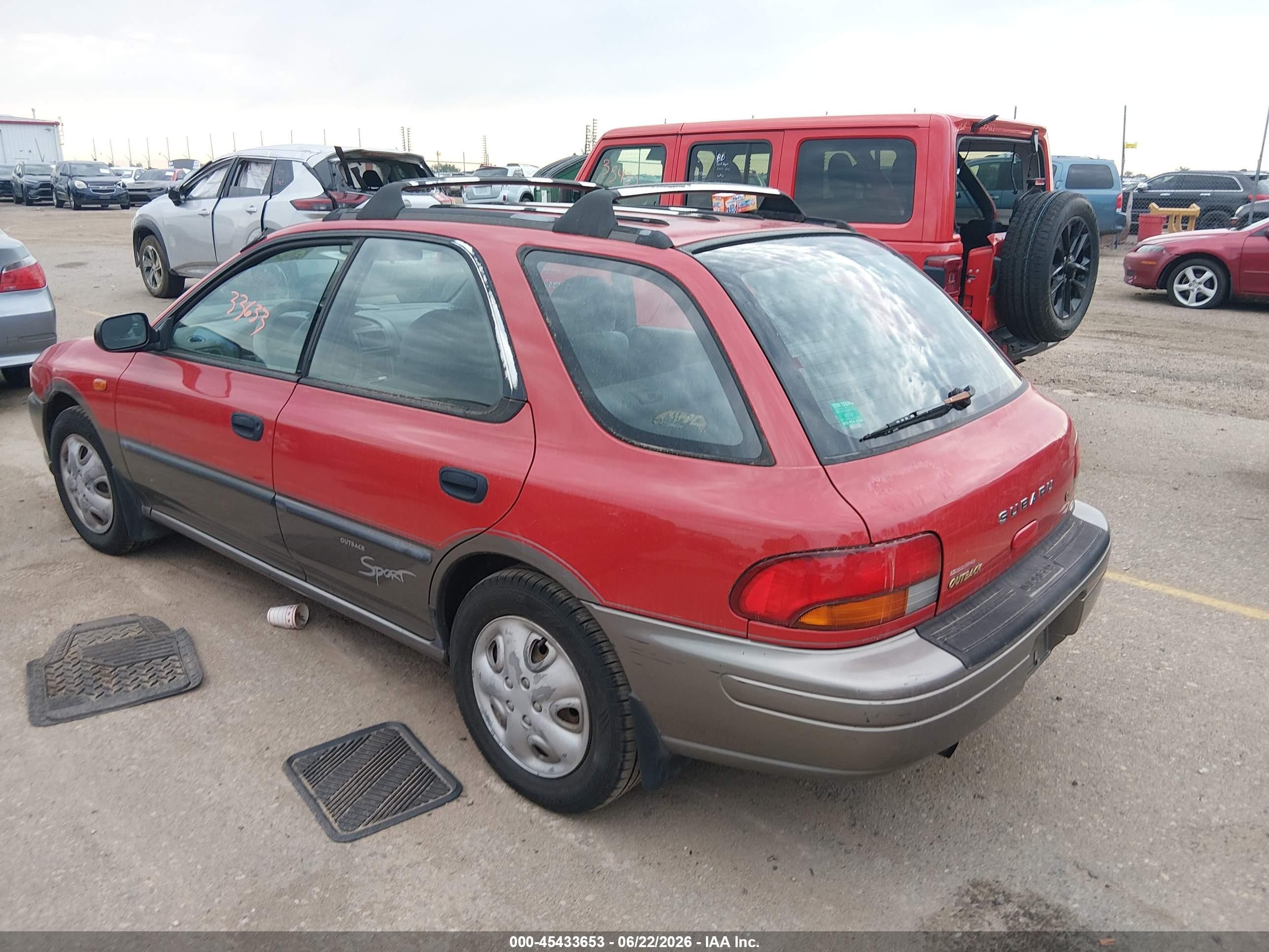 1999 Subaru Impreza Outback Sport Red vin: JF1GF4853XH800507