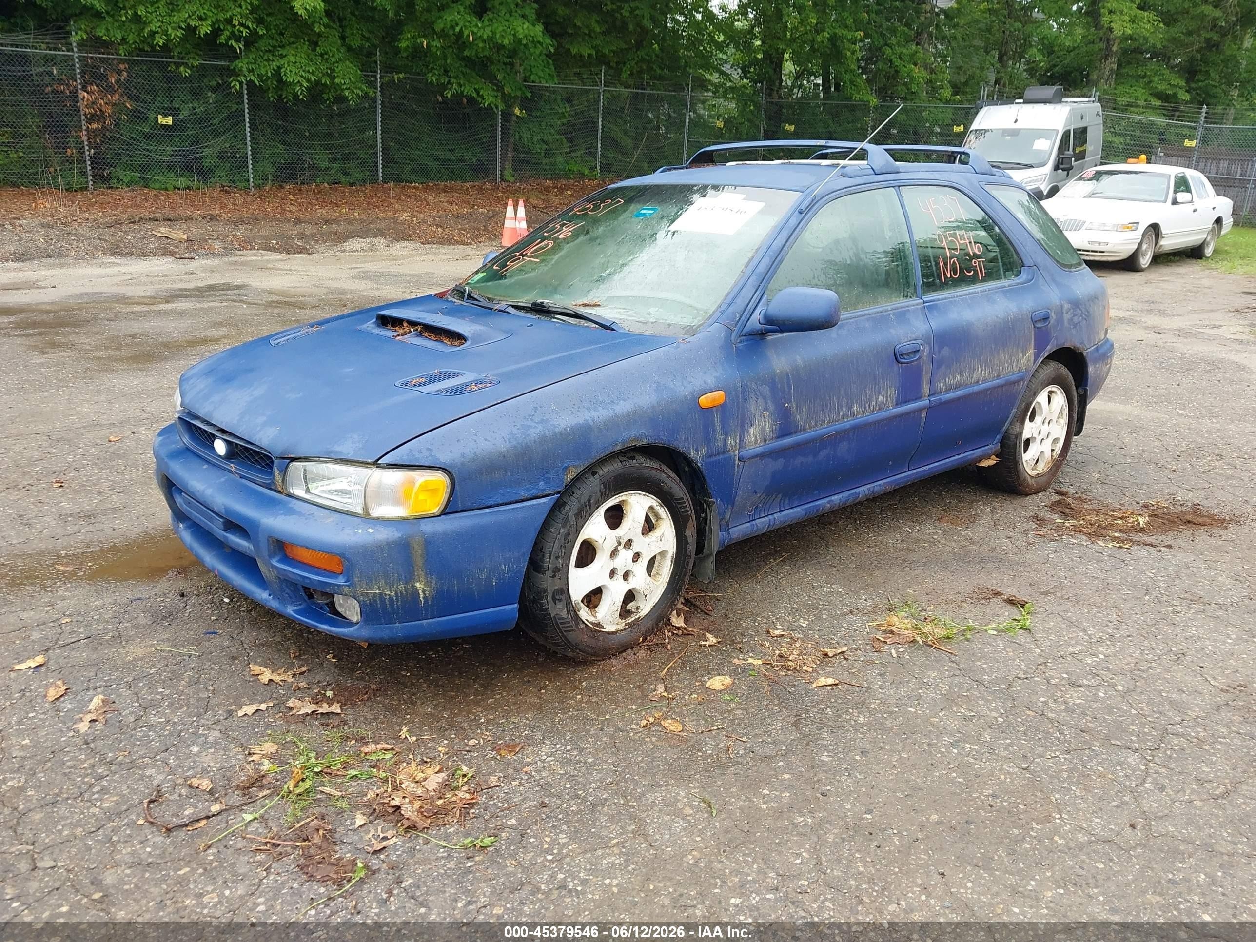 1999 Subaru Impreza Outback Sport Blue vin: JF1GF4853XH803505