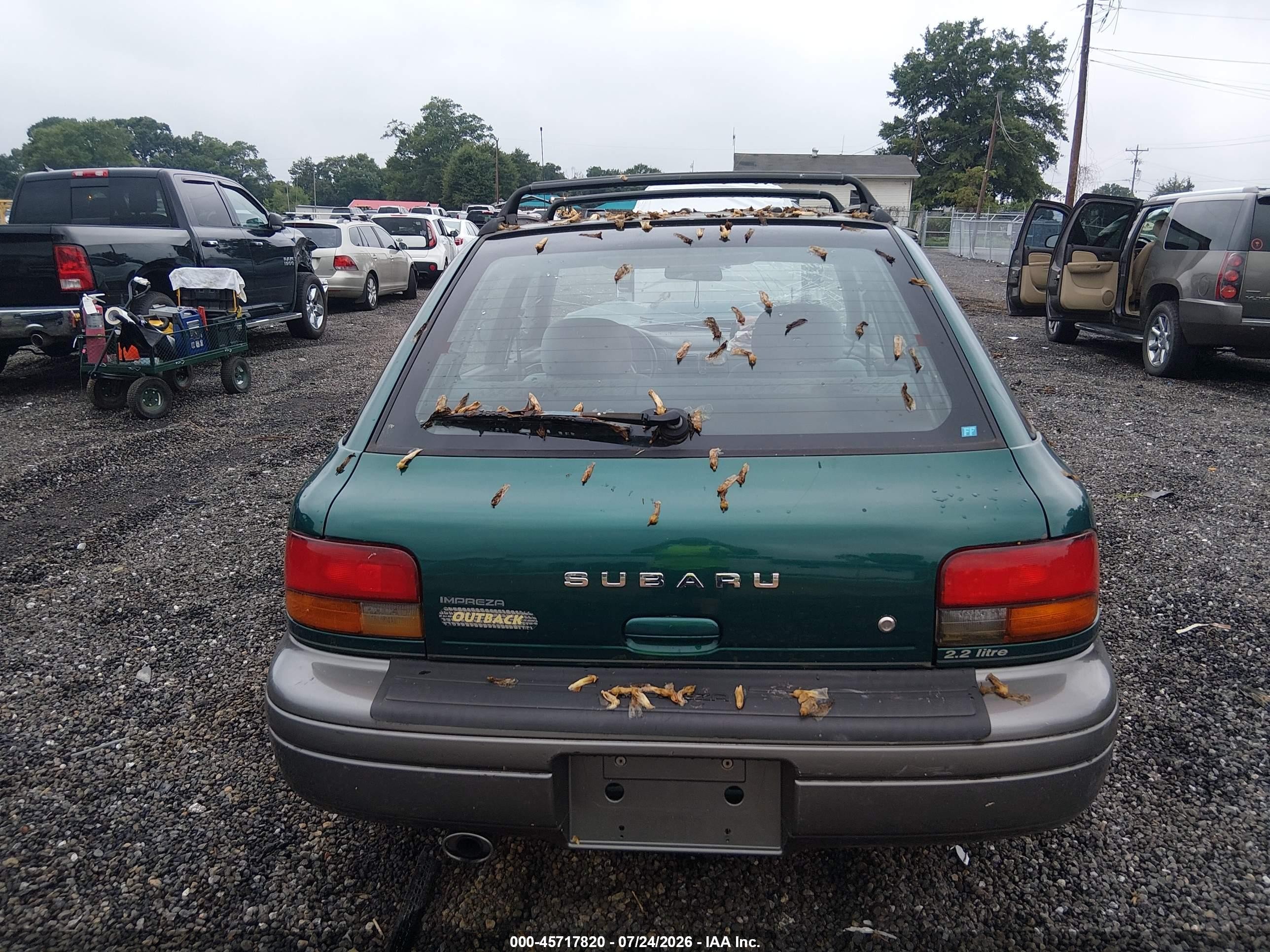 1997 Subaru Impreza Outback Sport Green vin: JF1GF4854VG816010