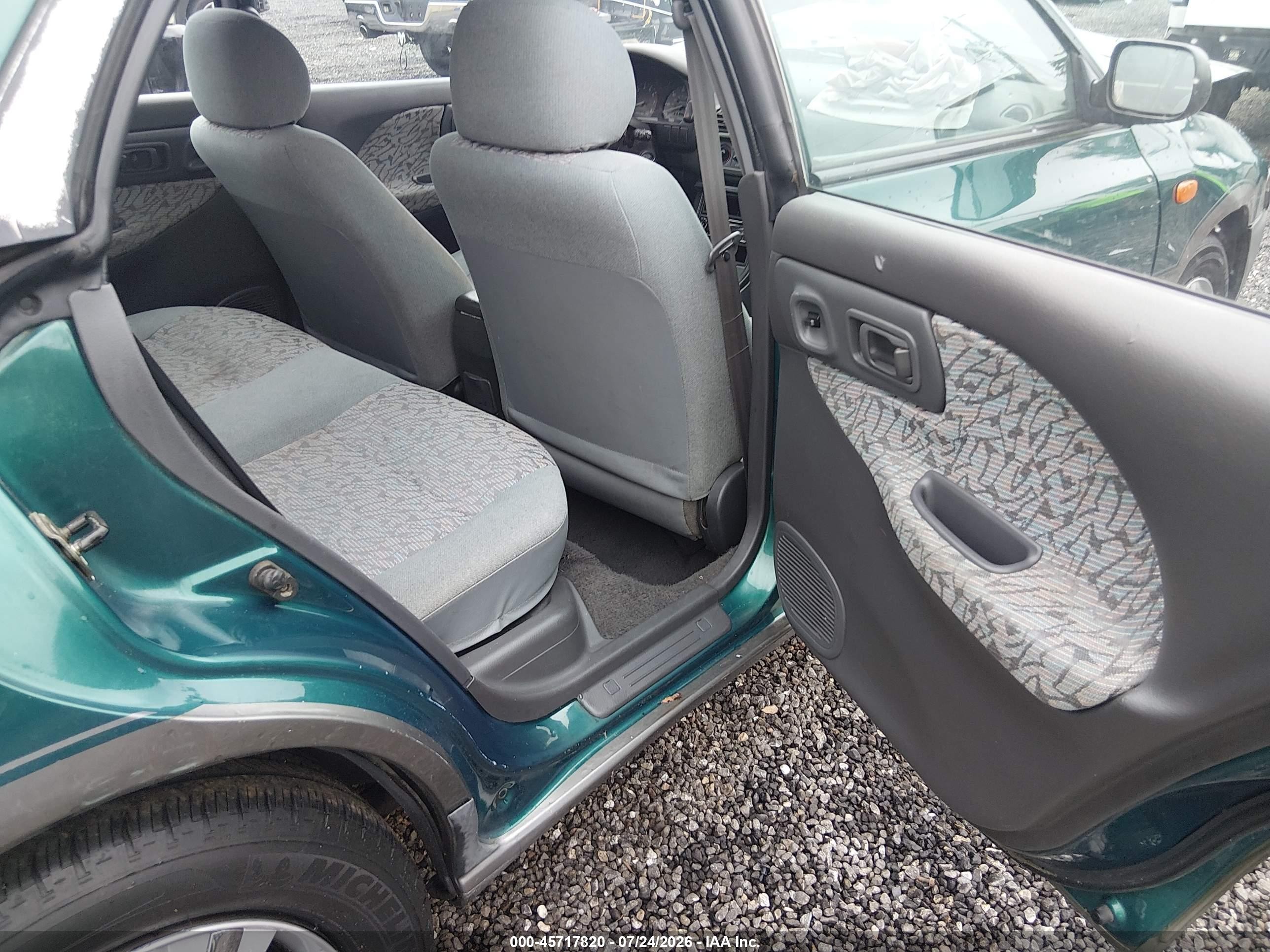 1997 Subaru Impreza Outback Sport Green vin: JF1GF4854VG816010