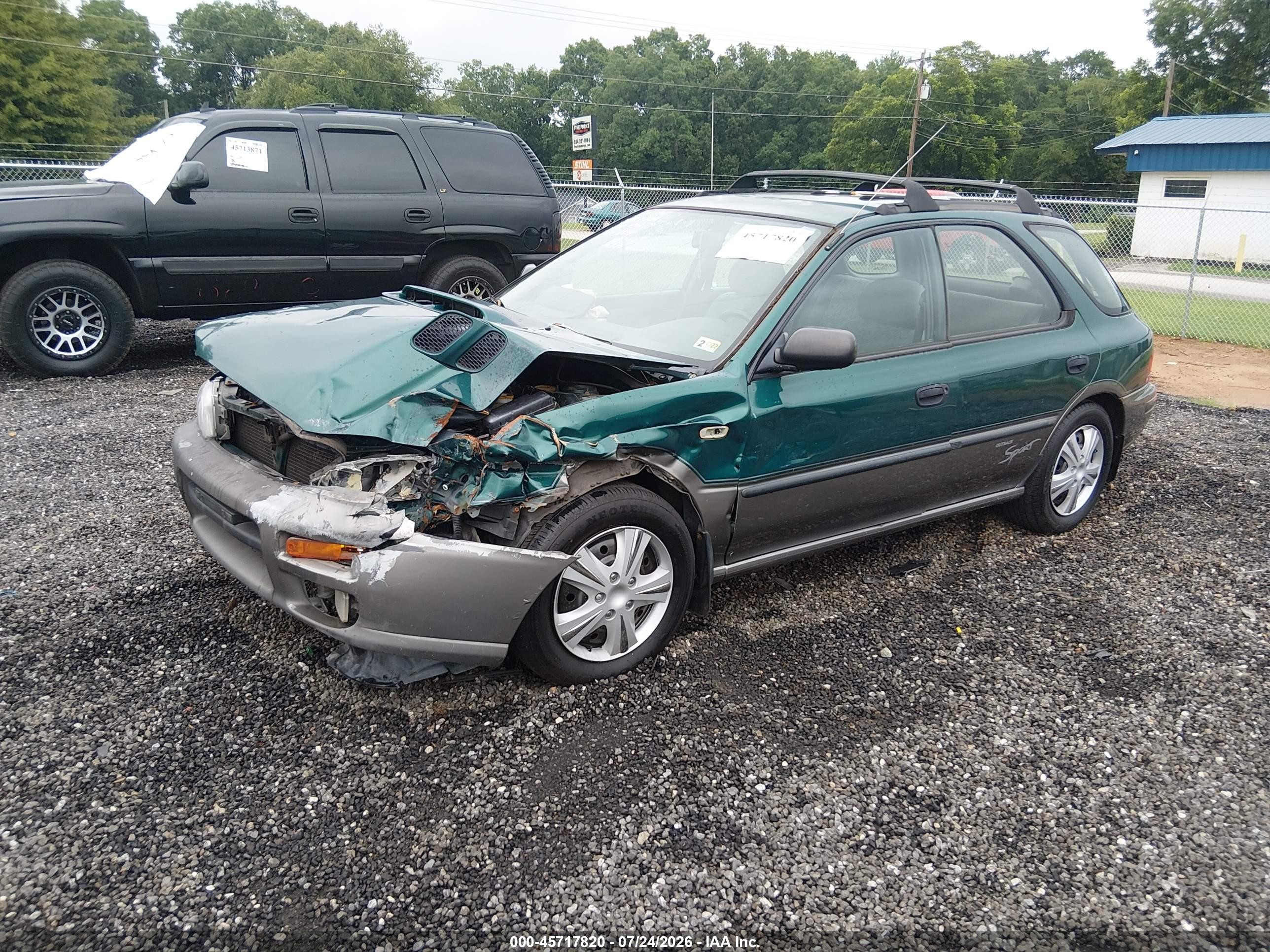 1997 Subaru Impreza Outback Sport Green vin: JF1GF4854VG816010