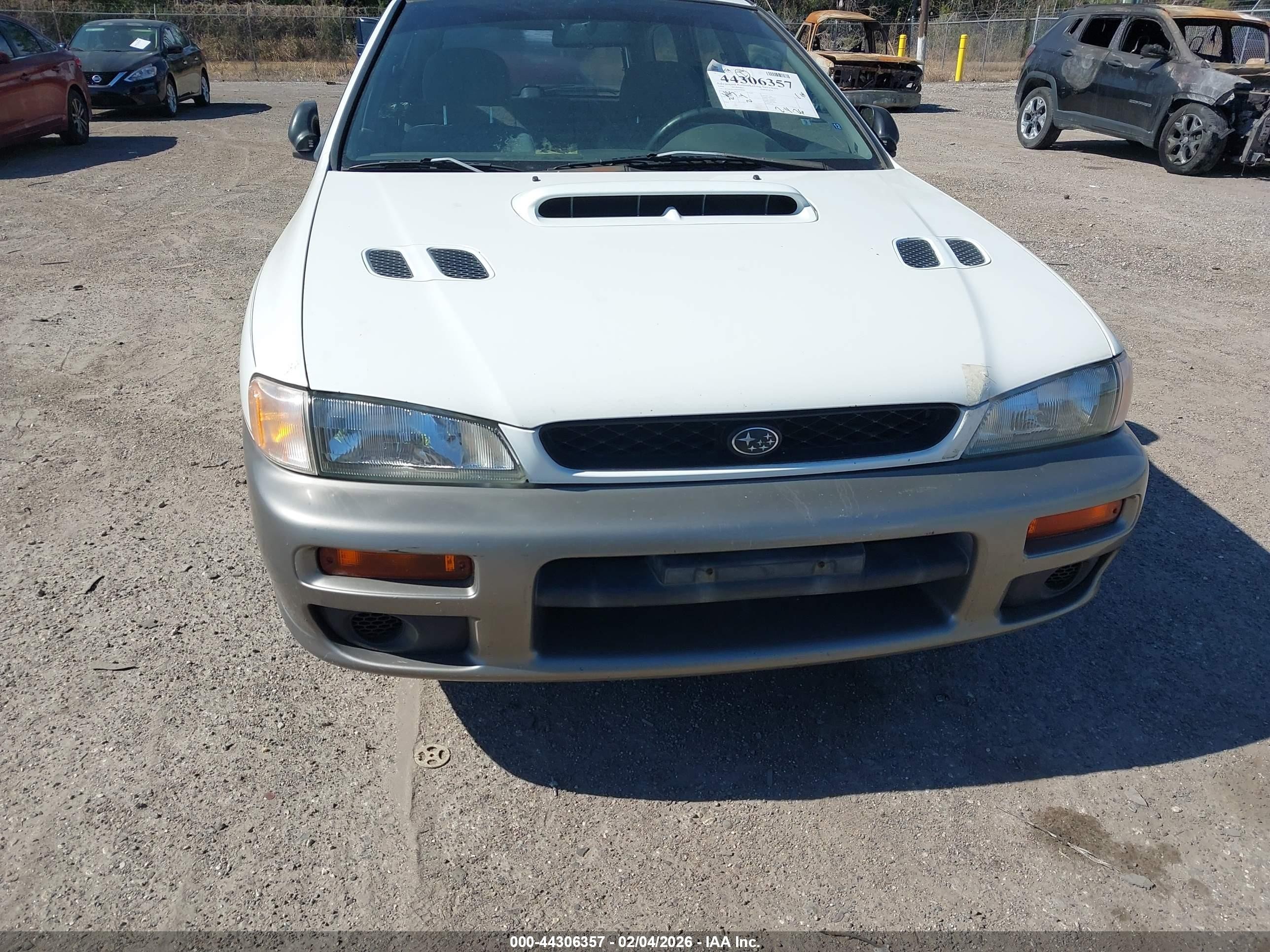 1998 Subaru Impreza Outback Sport White vin: JF1GF4854WH808484
