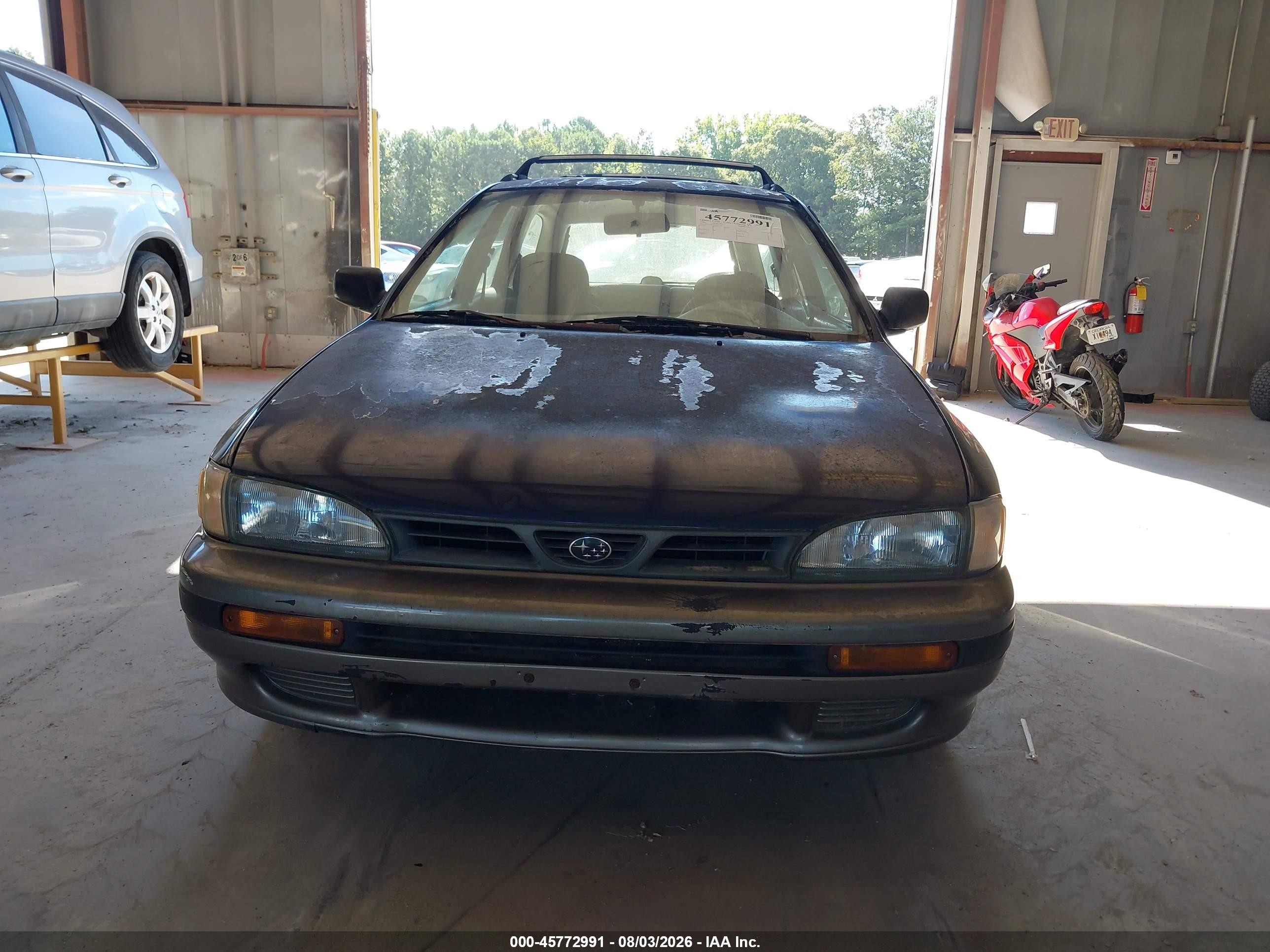 1996 Subaru Impreza Outback Blue vin: JF1GF4856TG814191