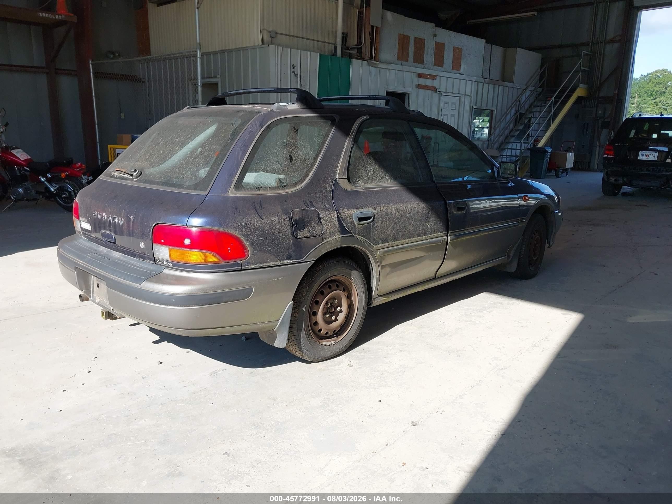 1996 Subaru Impreza Outback Blue vin: JF1GF4856TG814191