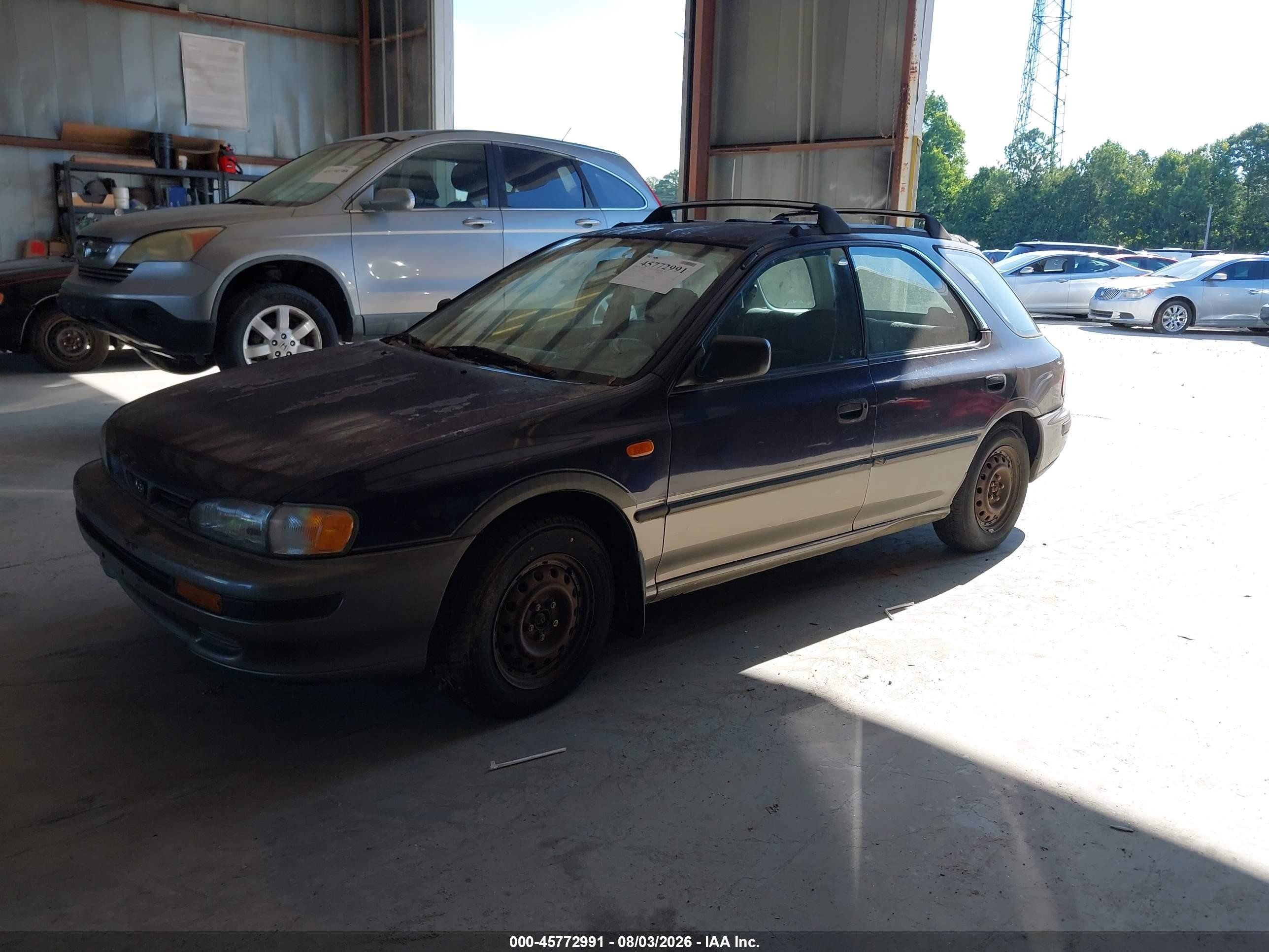 1996 Subaru Impreza Outback Blue vin: JF1GF4856TG814191