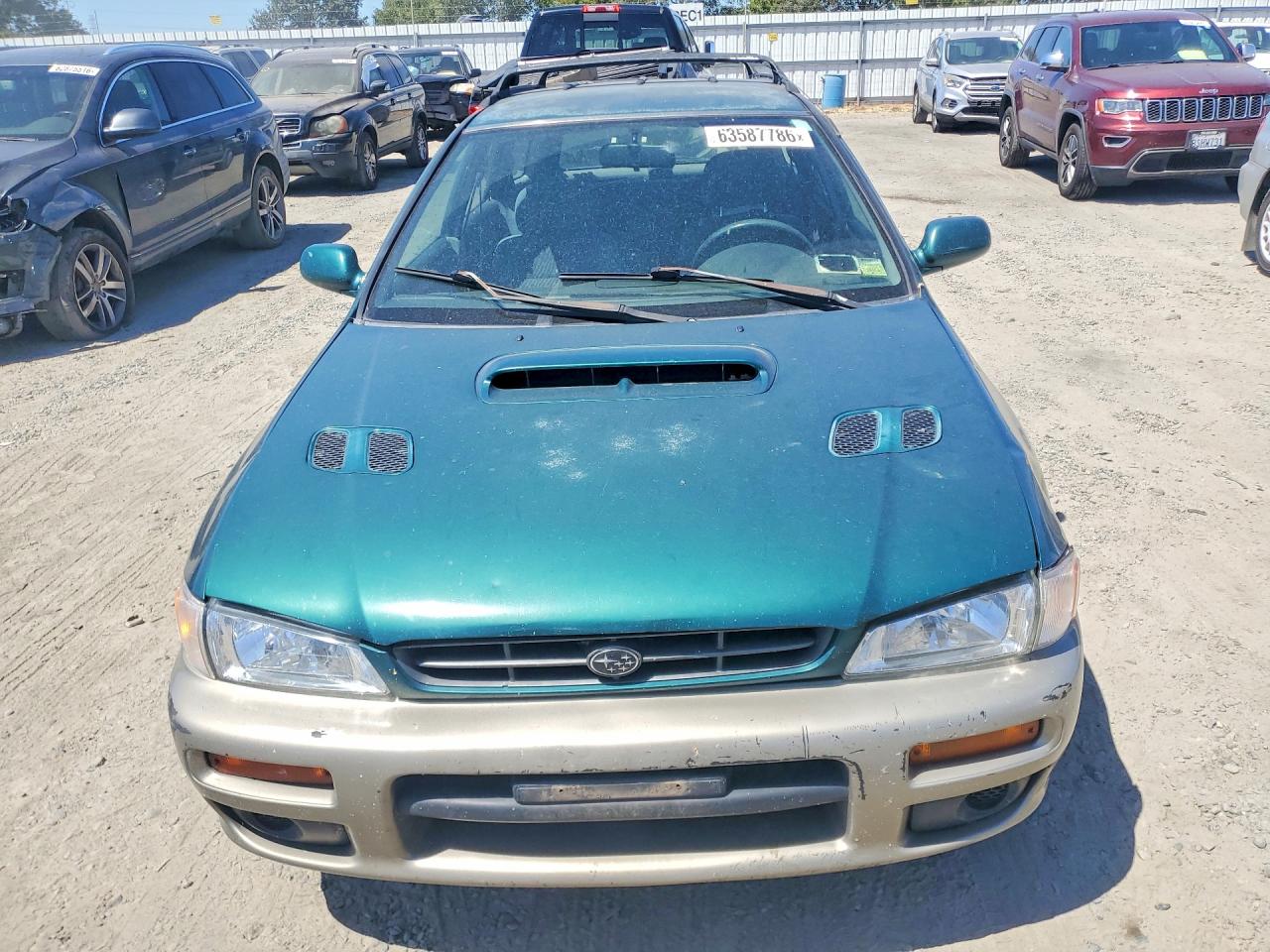 2000 Subaru Impreza Outback Sport Green vin: JF1GF4857YH804030
