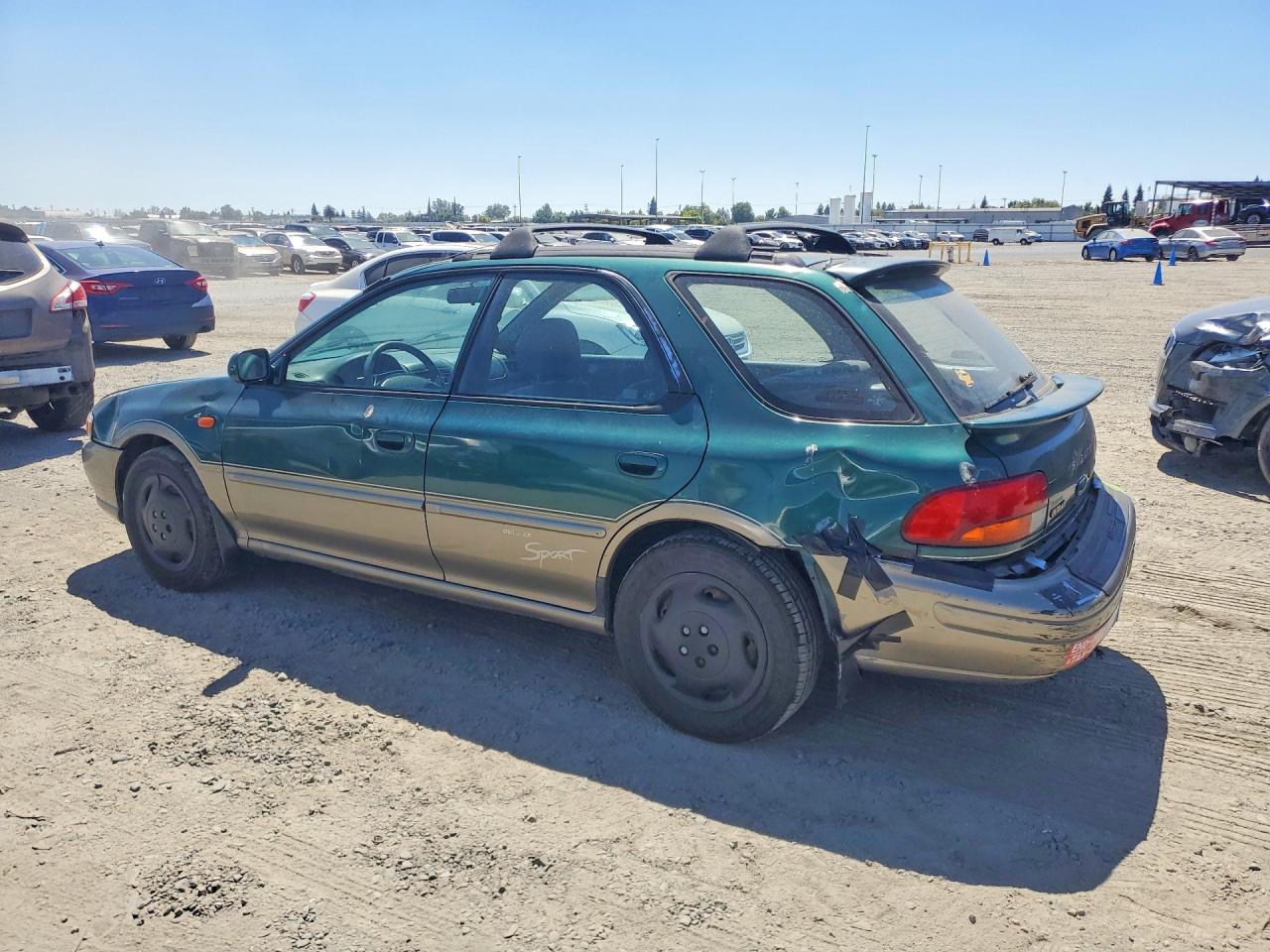 2000 Subaru Impreza Outback Sport Green vin: JF1GF4857YH804030