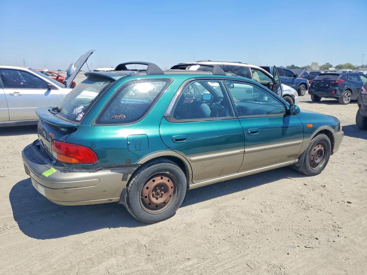 2000 Subaru Impreza Outback Sport Green vin: JF1GF4857YH804030