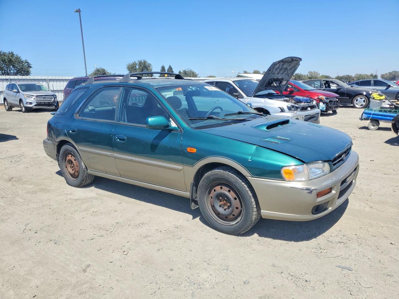 2000 Subaru Impreza Outback Sport Green vin: JF1GF4857YH804030