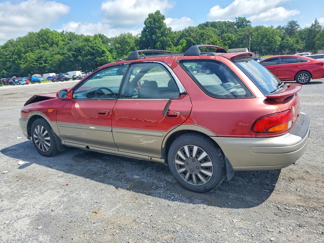 2000 Subaru Impreza Outback Sport Red vin: JF1GF4857YH807610