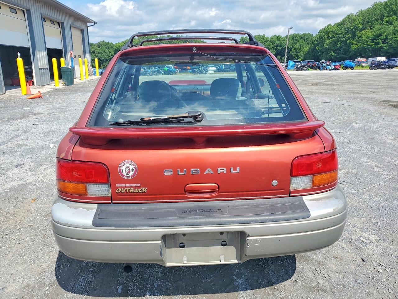 2000 Subaru Impreza Outback Sport Red vin: JF1GF4857YH807610