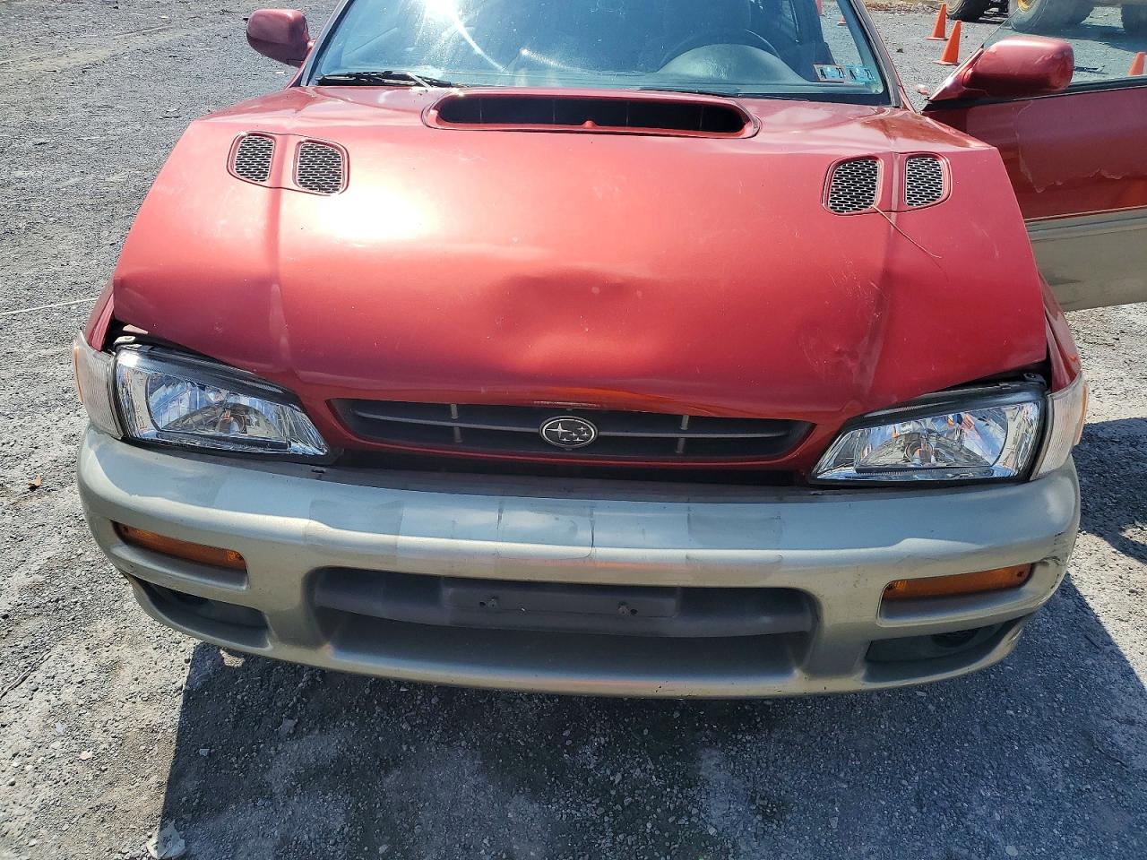 2000 Subaru Impreza Outback Sport Red vin: JF1GF4857YH807610