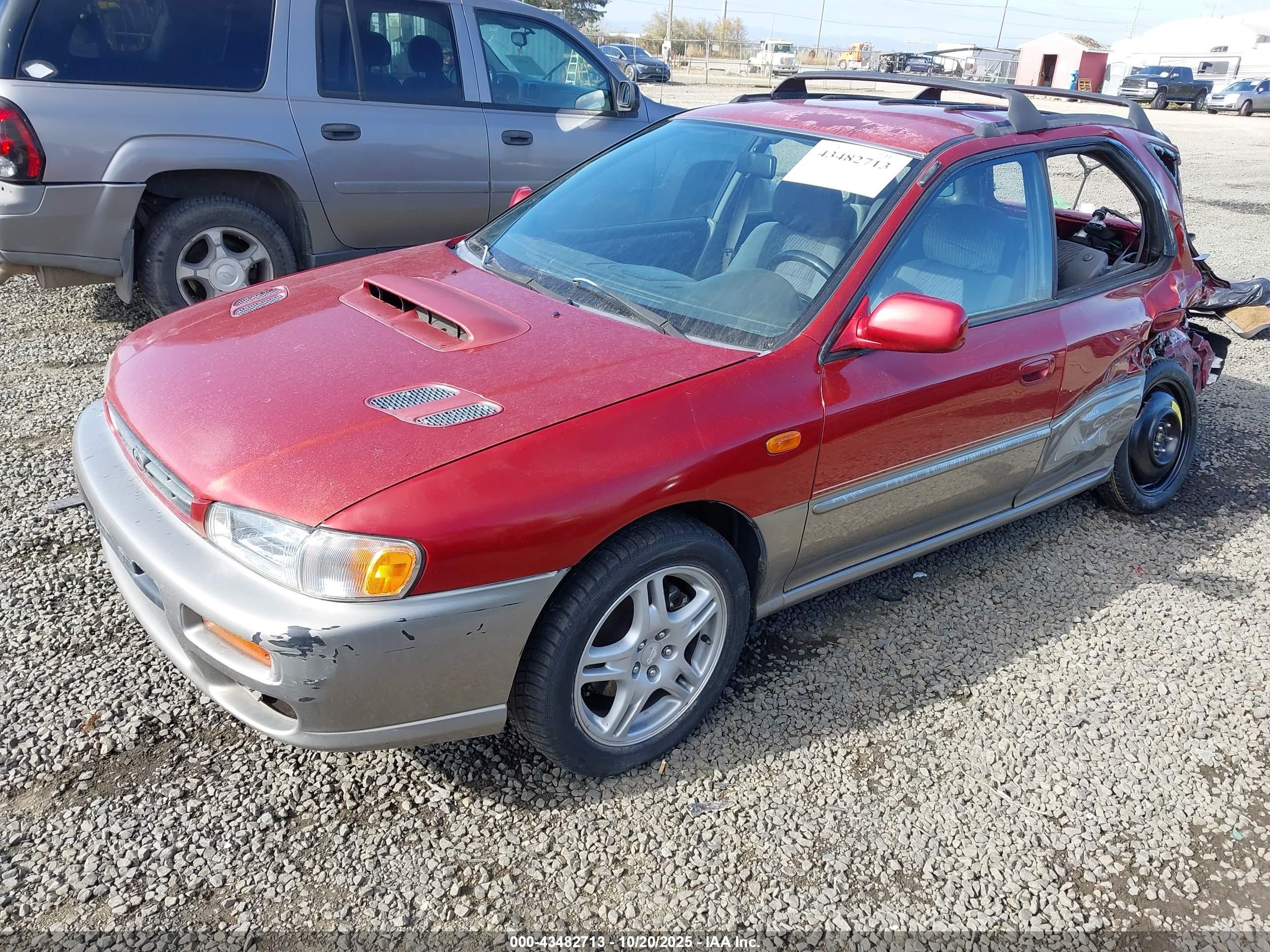 2001 Subaru Impreza Outback Sport   Red vin: JF1GF48581G800290