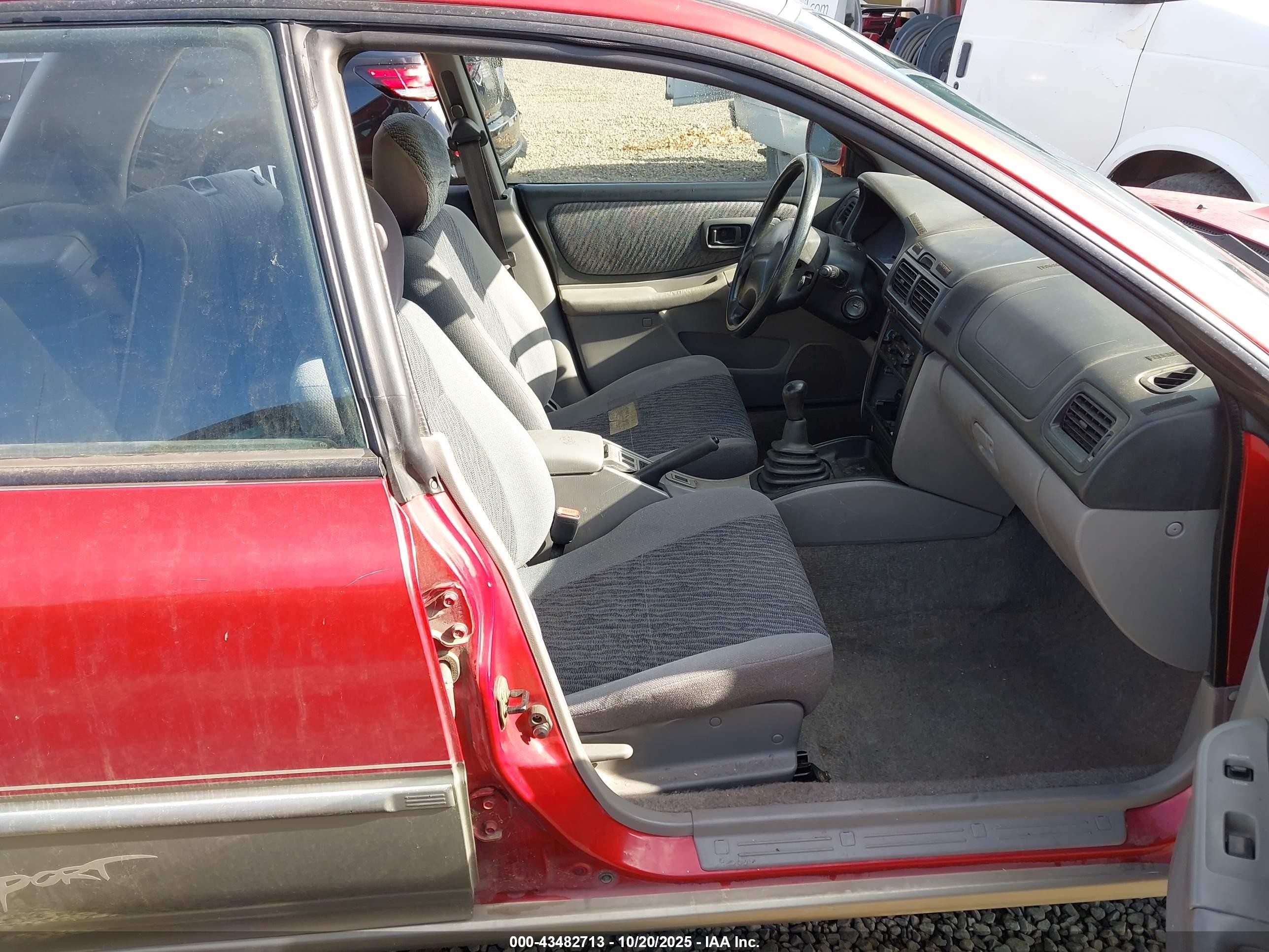 2001 Subaru Impreza Outback Sport   Red vin: JF1GF48581G800290