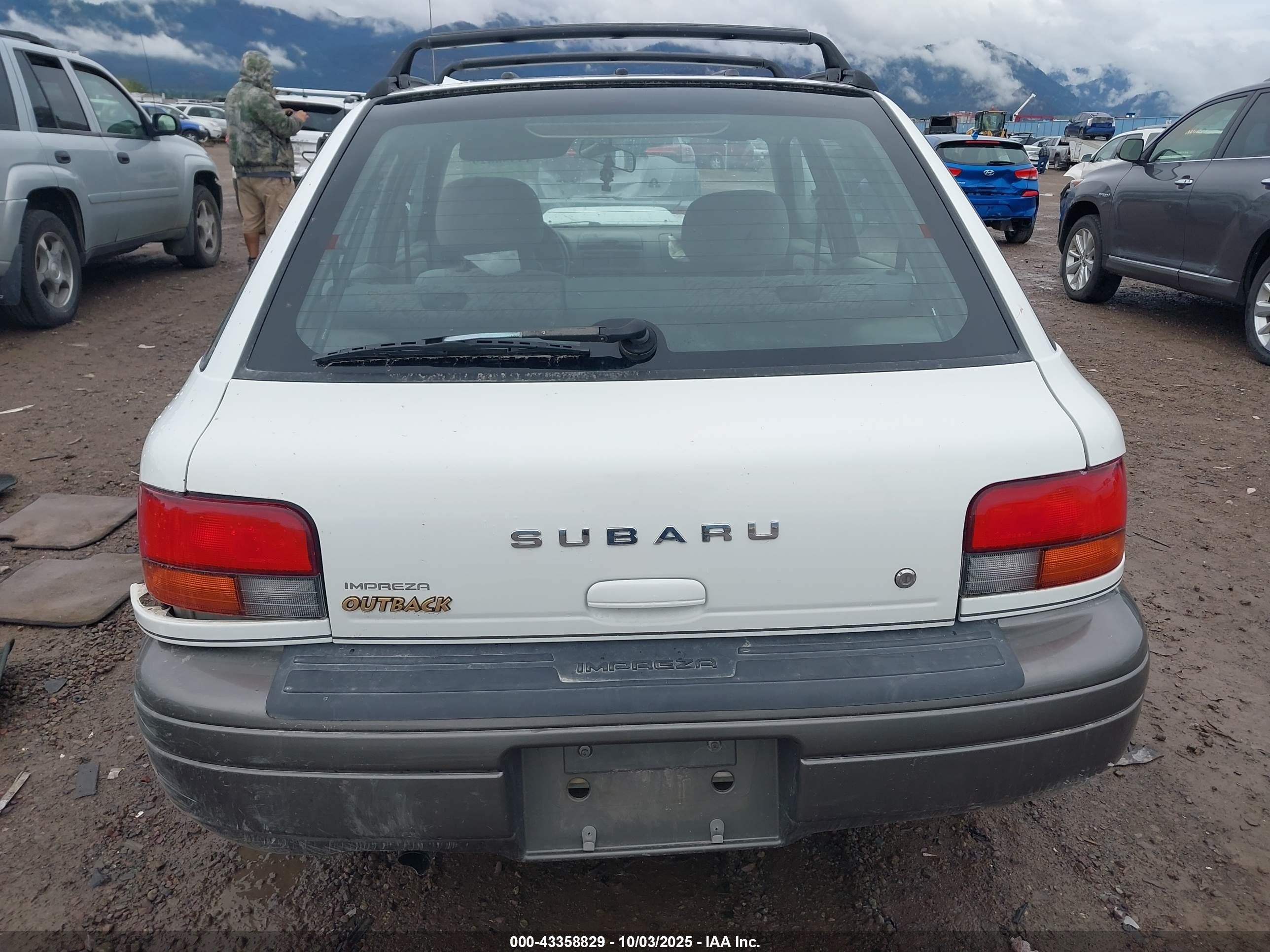 1998 Subaru Impreza Outback Sport White vin: JF1GF4858WH808245